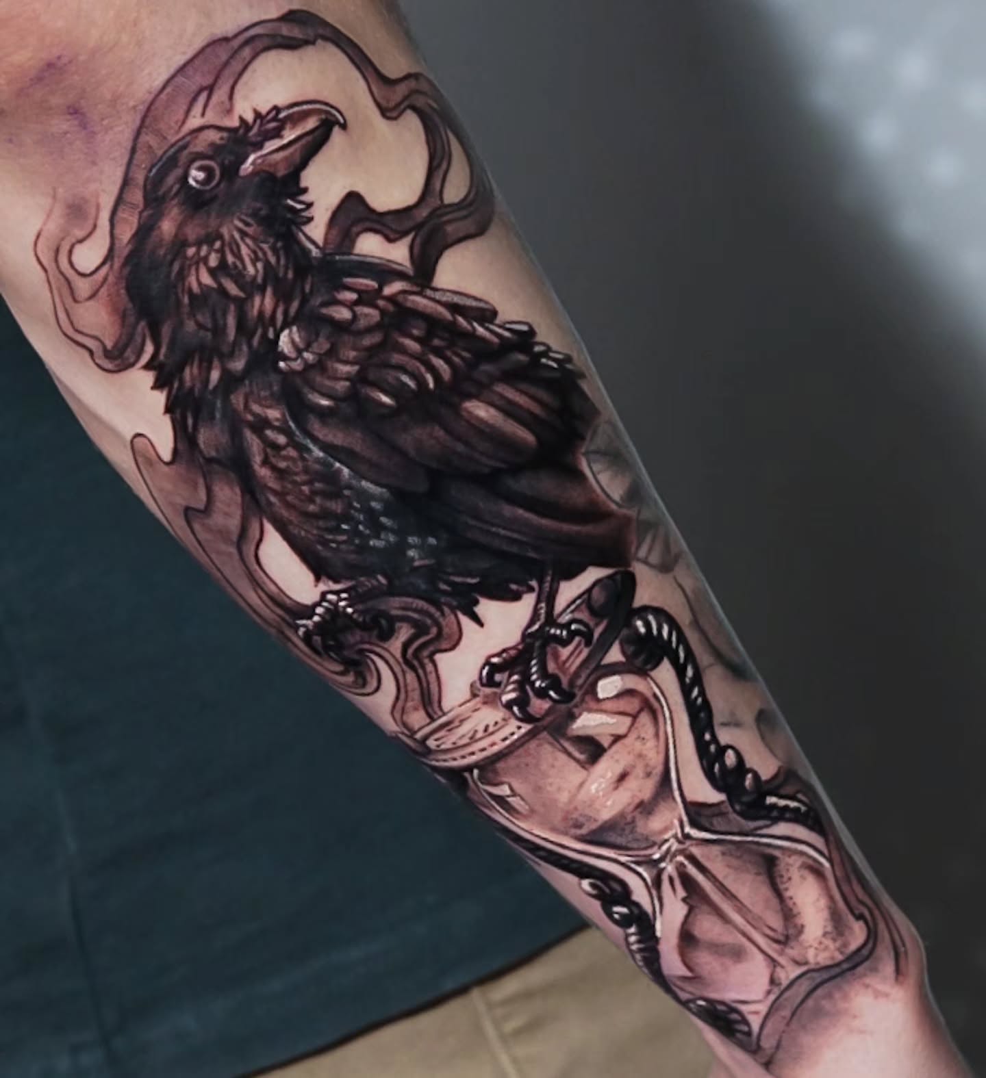 Crow realism tattoo on the forearm by Bo
