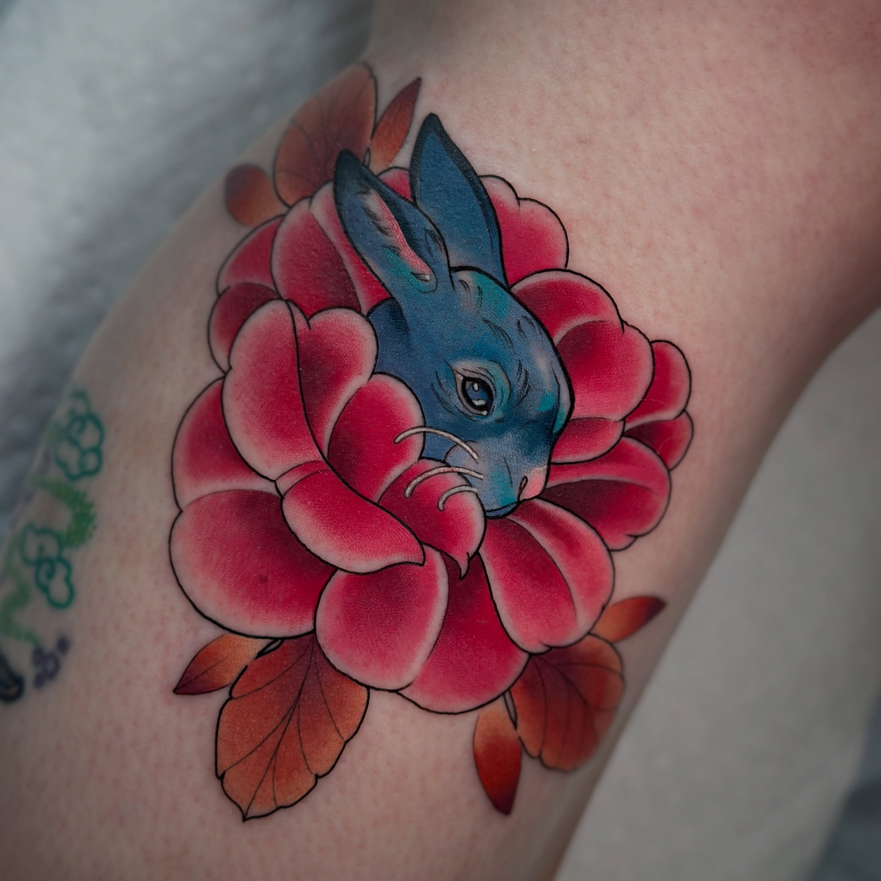 Rabbit in flower American traditional tattoo on the forearm by โ ๐ฟ๐๐ ๐ญ๐๐๐๐