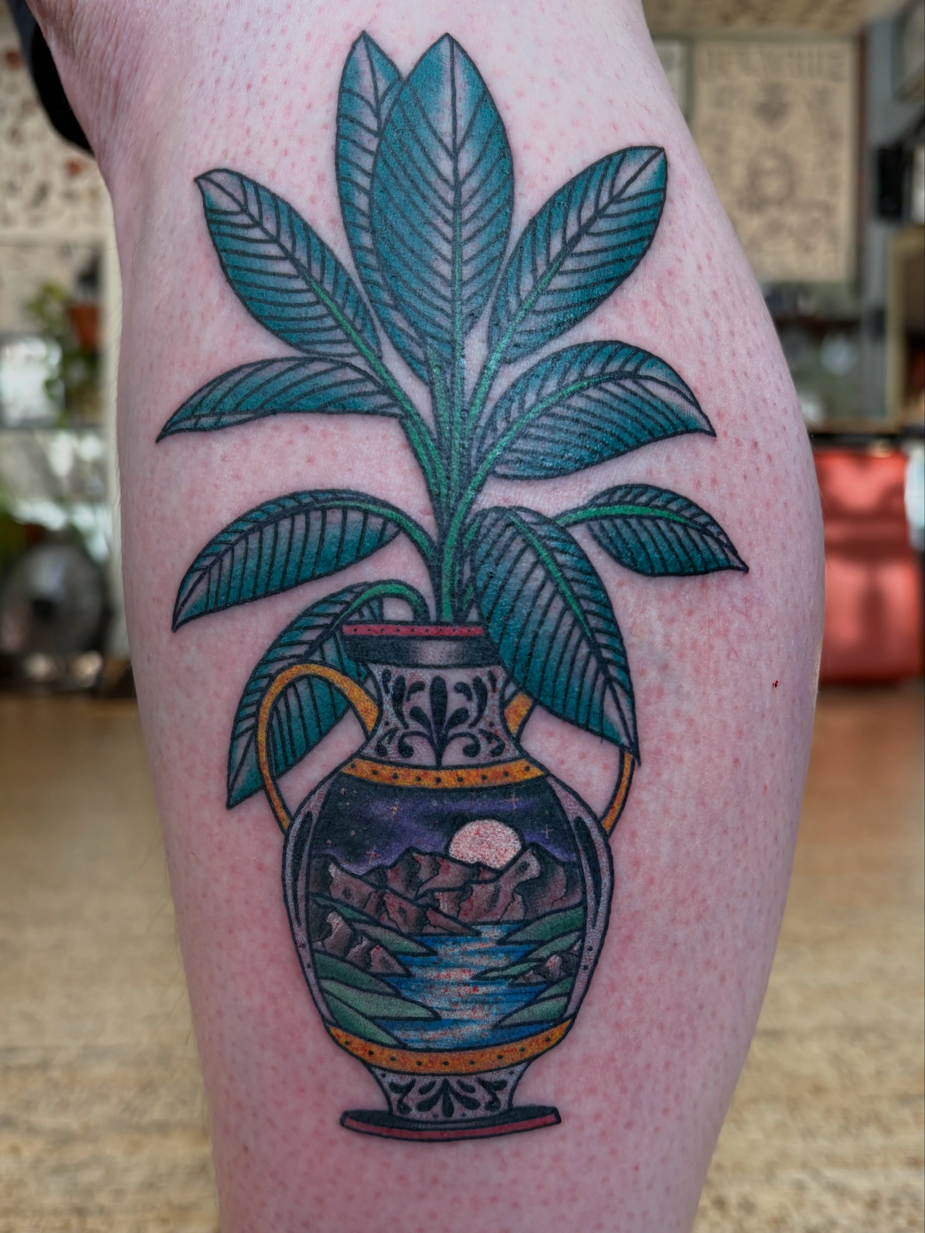 Plant in vase American traditional tattoo on the thigh by Kimber Teatro, Portland, Oregon
