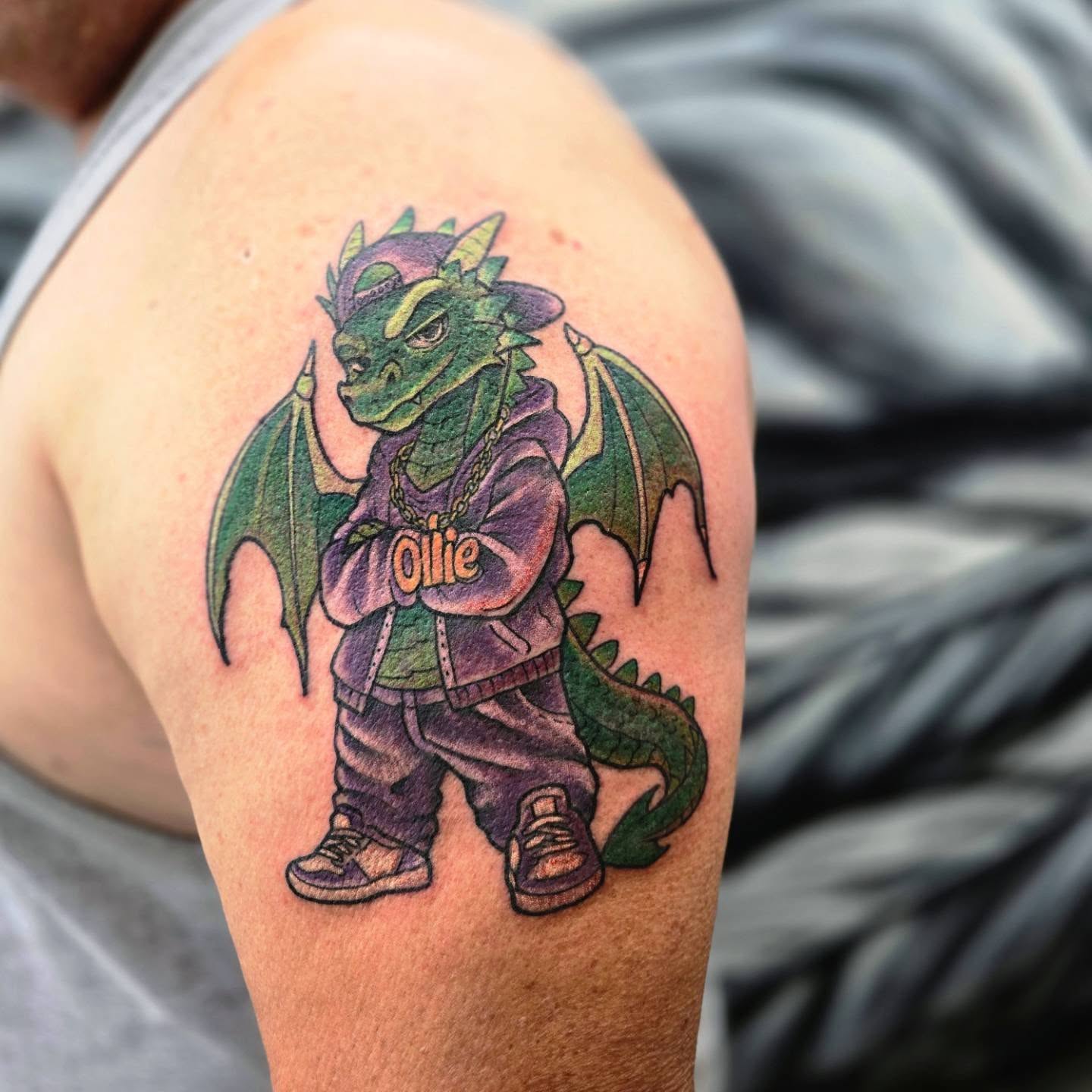 Dragon character new school tattoo on the shoulder by Jon Griffin, Maryville, Tennessee