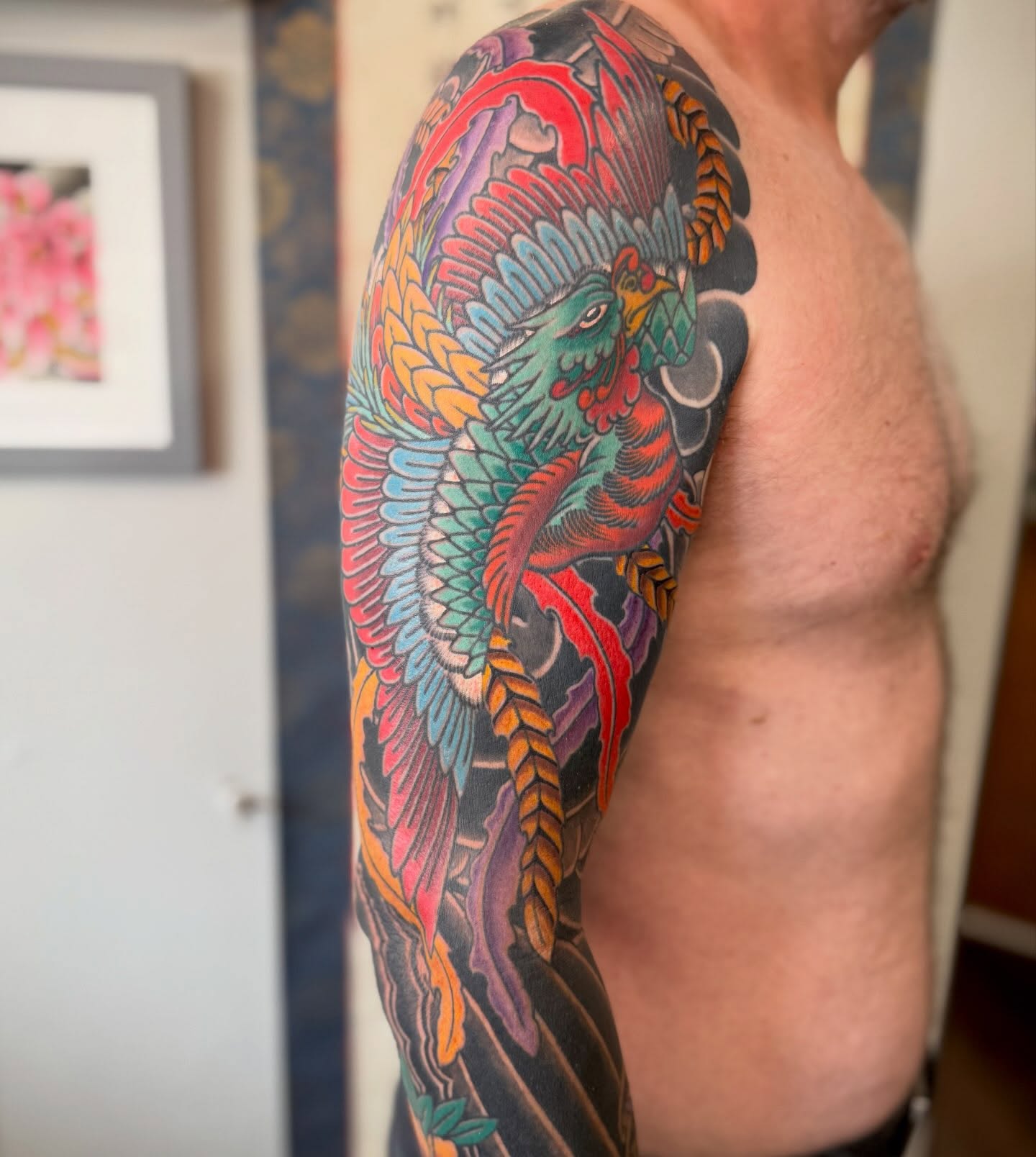 Phoenix japanese irezumi tattoo on the upper arm by Jason Eisenberg