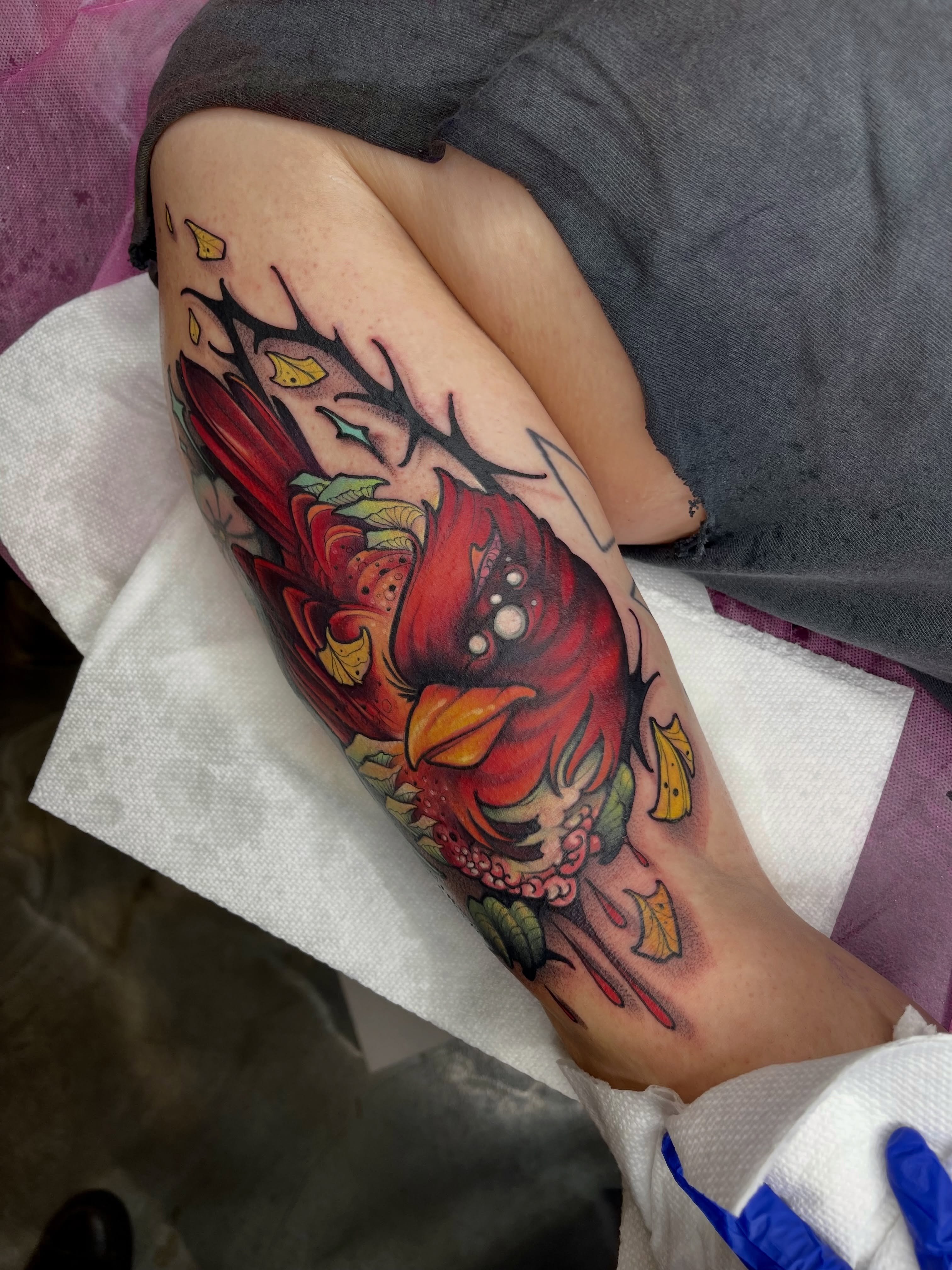 Red cardinal bird American traditional tattoo on the forearm by ceci✨, Edinburg, Texas