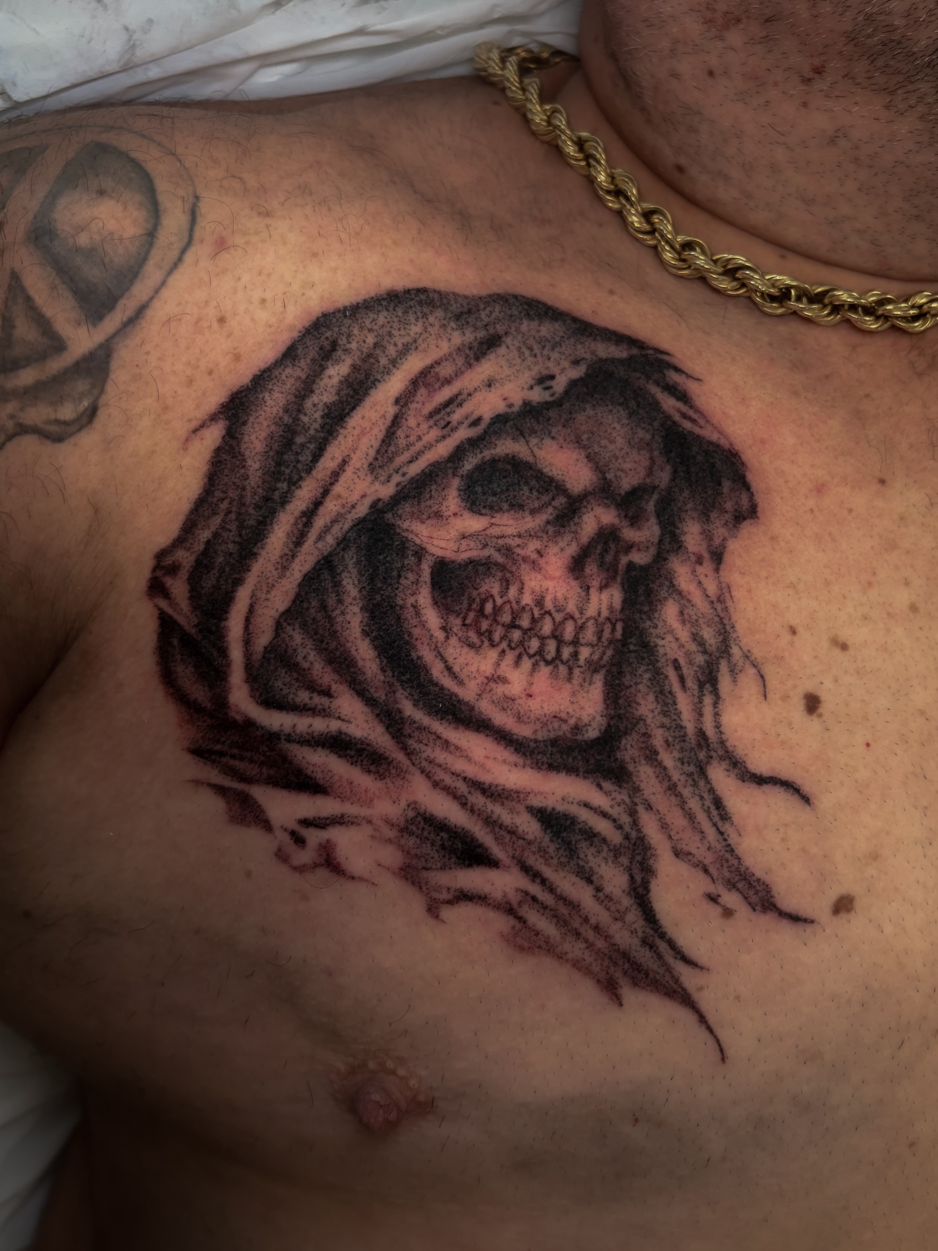 Grim reaper realism tattoo on the chest by Sal