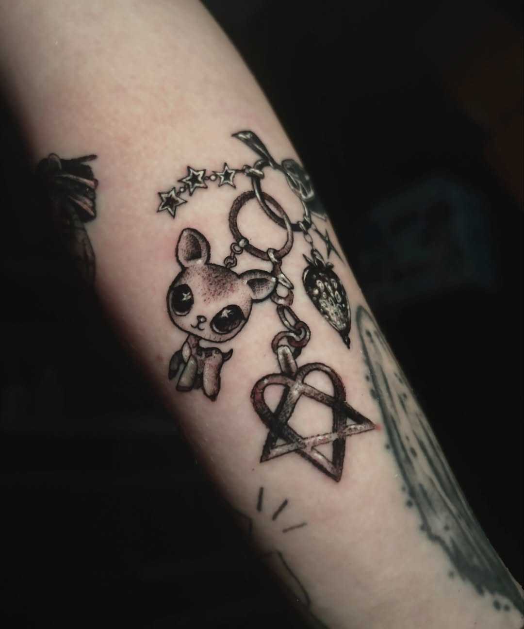 Kawaii animal charm anime tattoo on the forearm by Alle