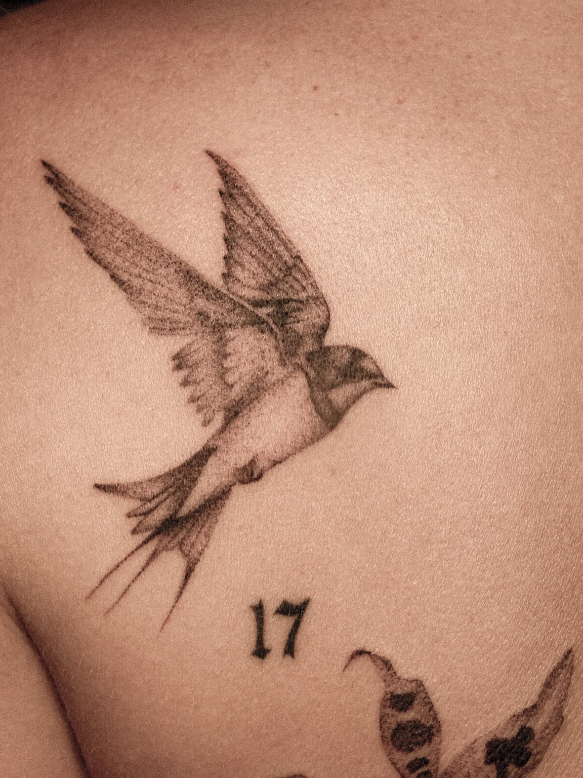 Swallow black and grey tattoo on the shoulder by ๐๐, Tacoma, Washington