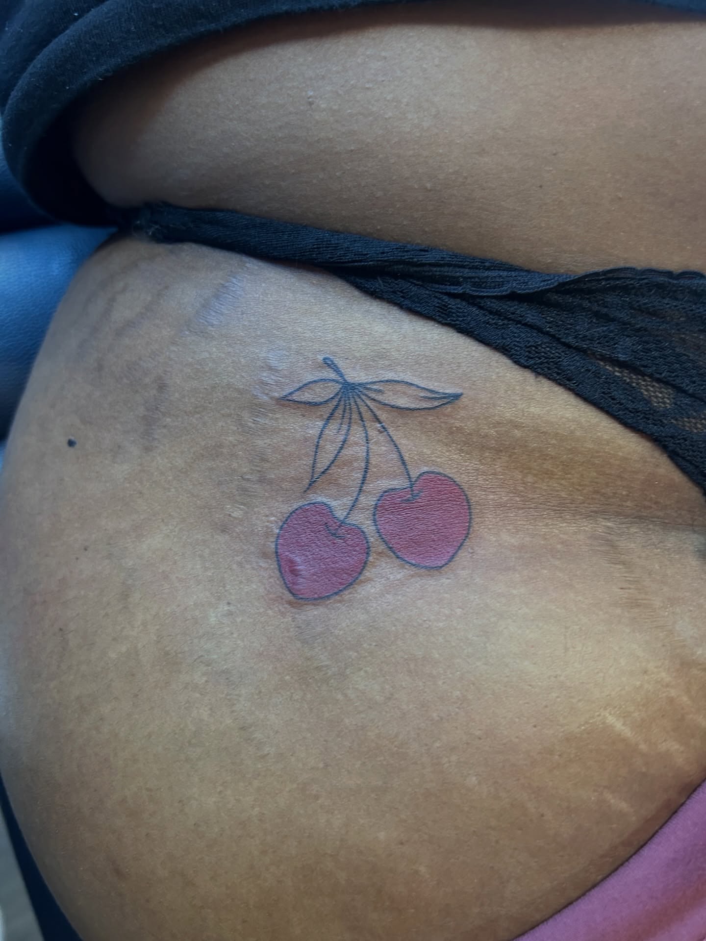 Cherries American traditional tattoo on the torso by Oto_art