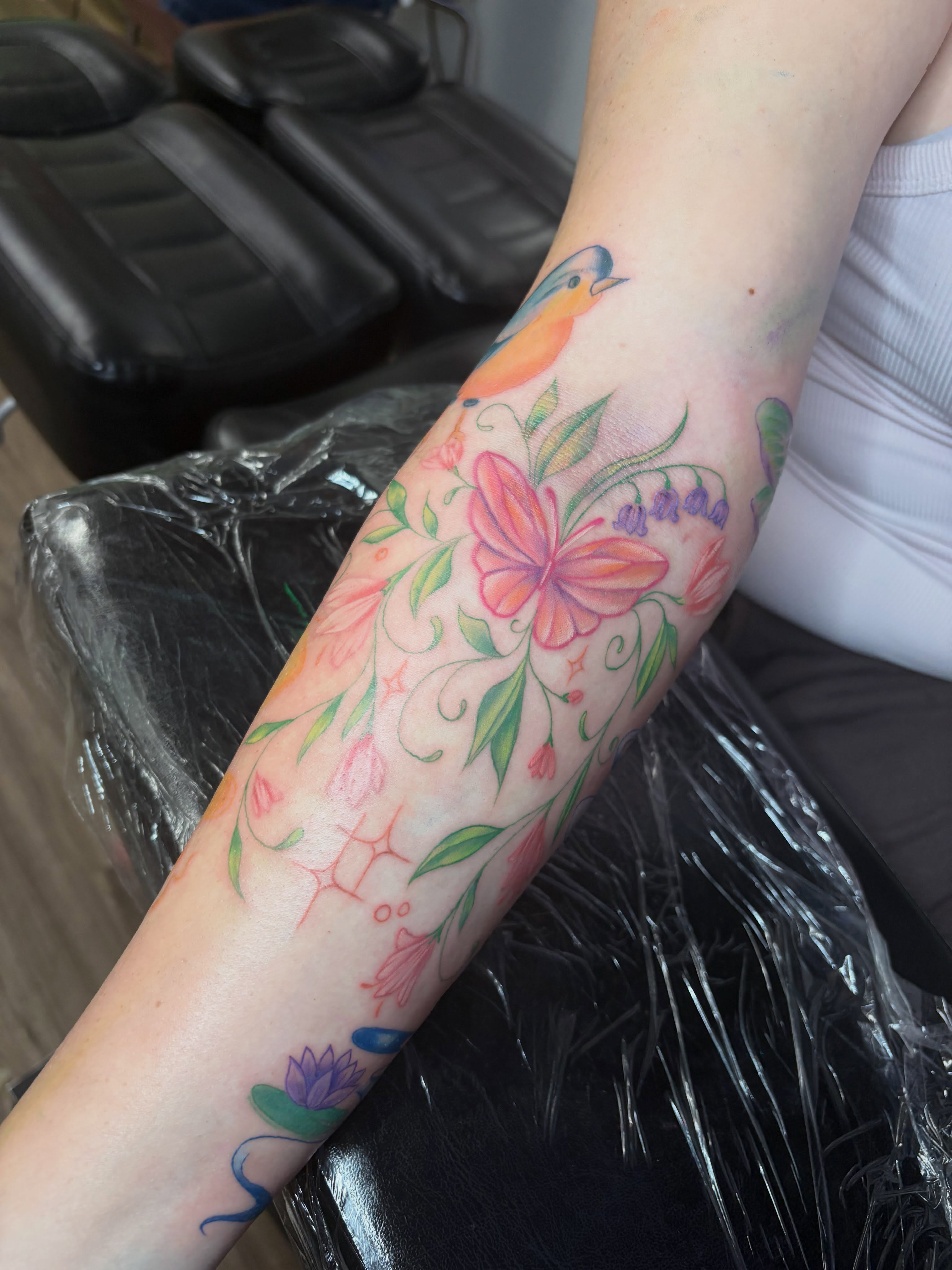 Floral arrangement new school tattoo on the forearm by Cincinnati Tattoo Artist