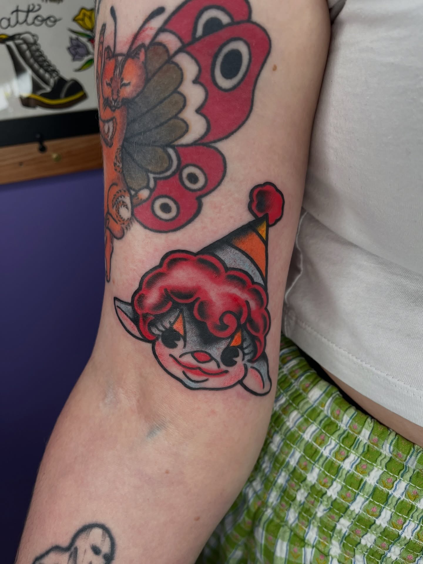 Clown and butterfly American traditional tattoo on the forearm by Autumn**🍓NOW BOOKING