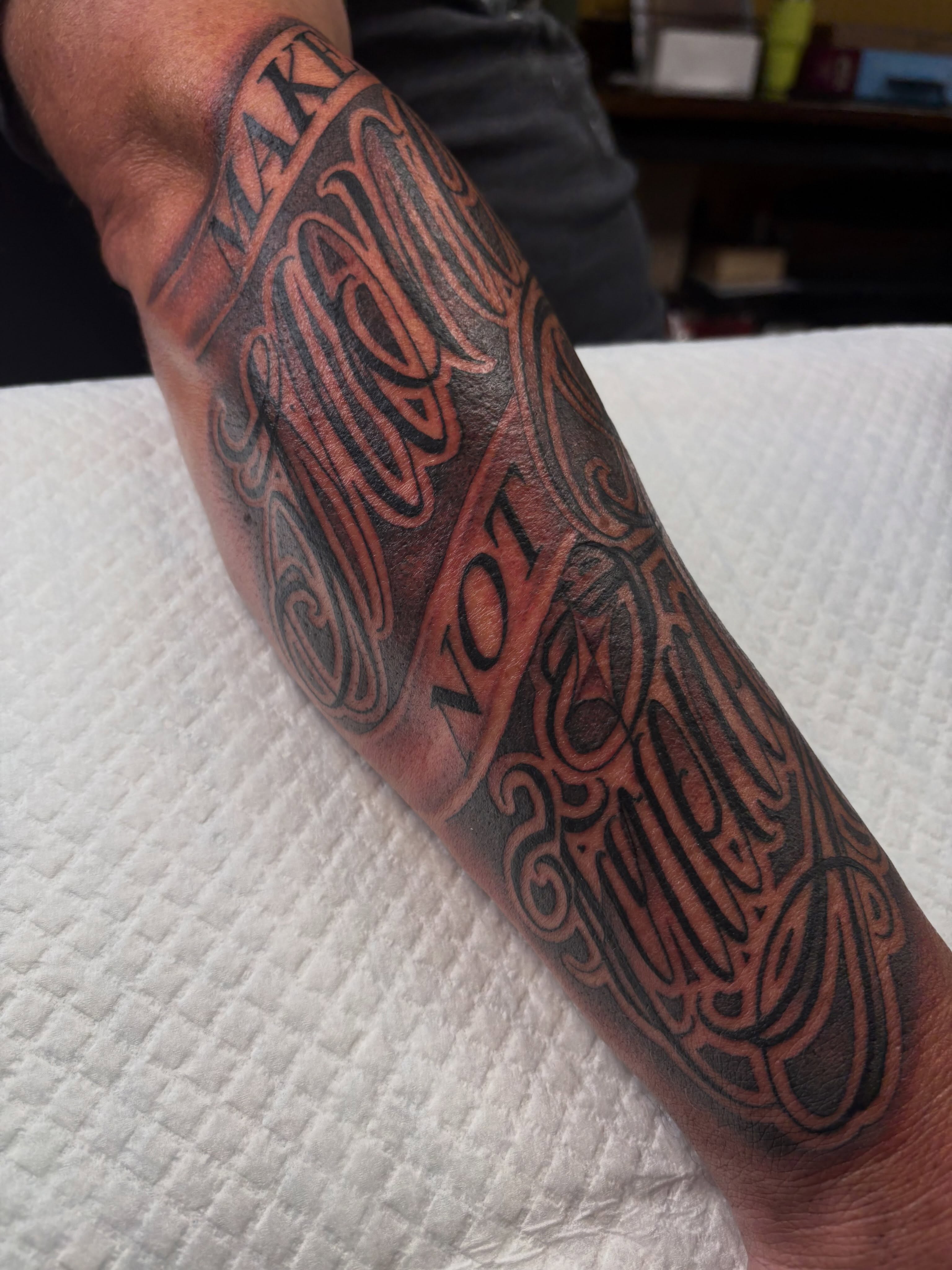 Script lettering lettering script tattoo on the forearm by Trusty Dizon Tattoo Artist