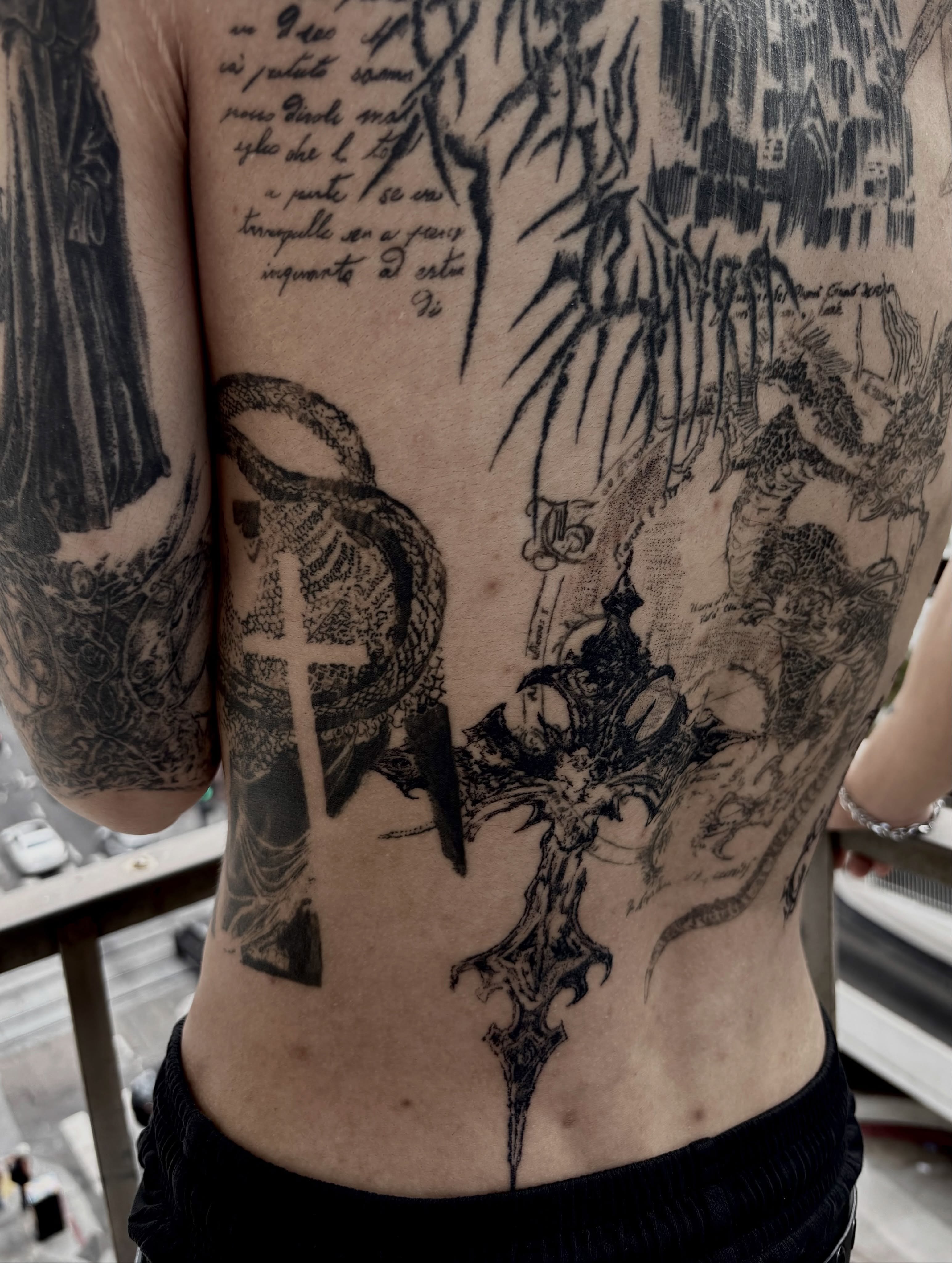 Cross and dragon dark realism tattoo on the torso by @douohv