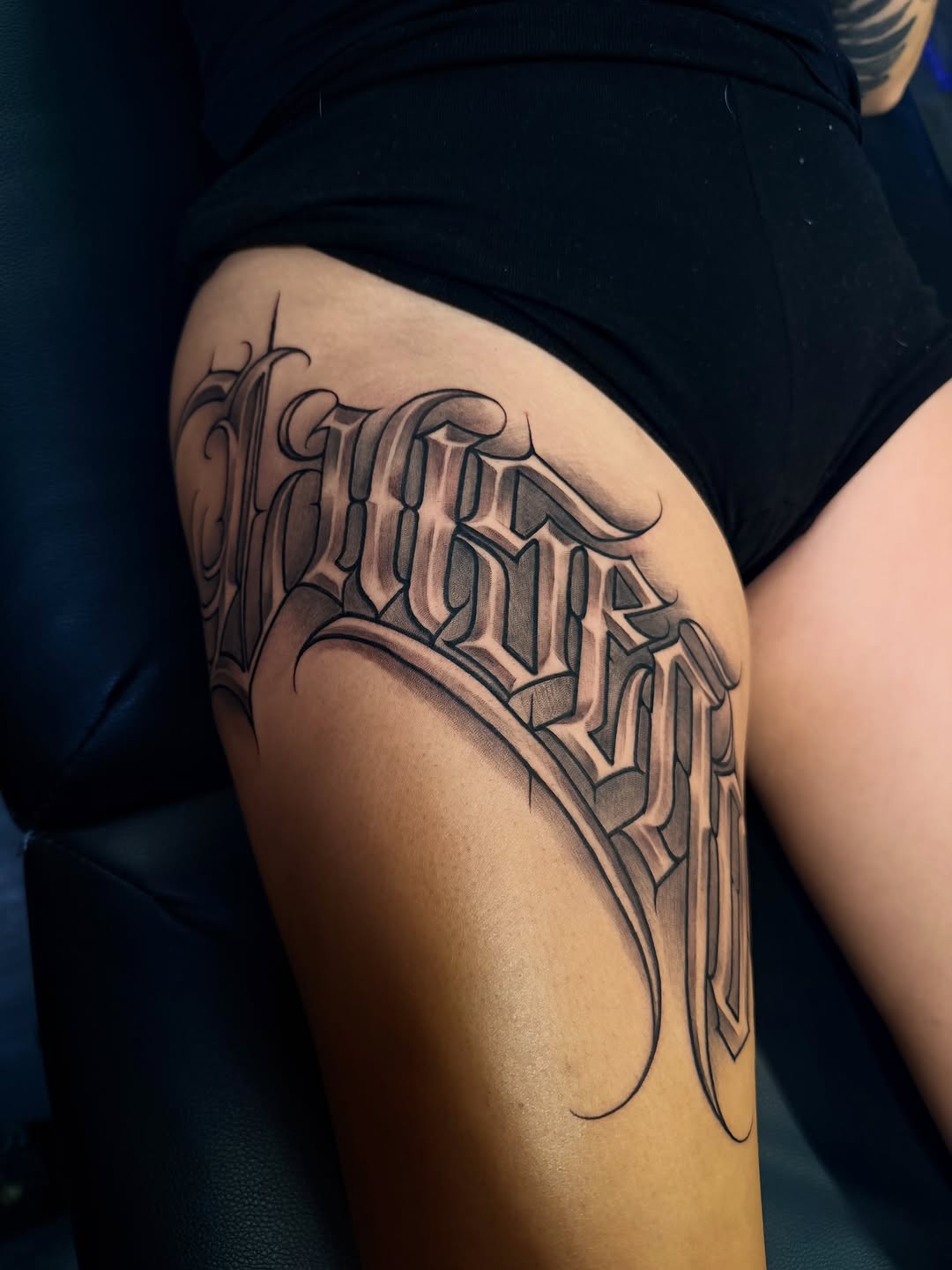 Tattoo by @stillballin6_ — lettering_script, chicano