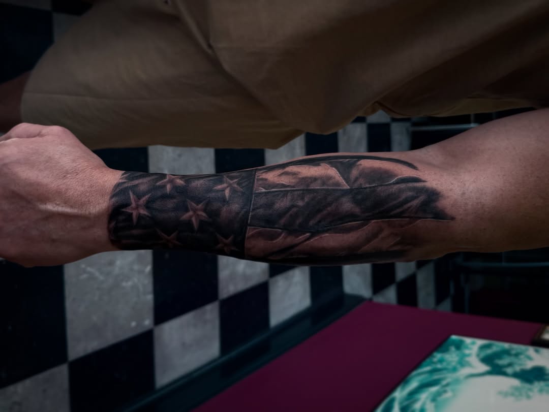 American flag American traditional tattoo on the forearm by Juan Pablo