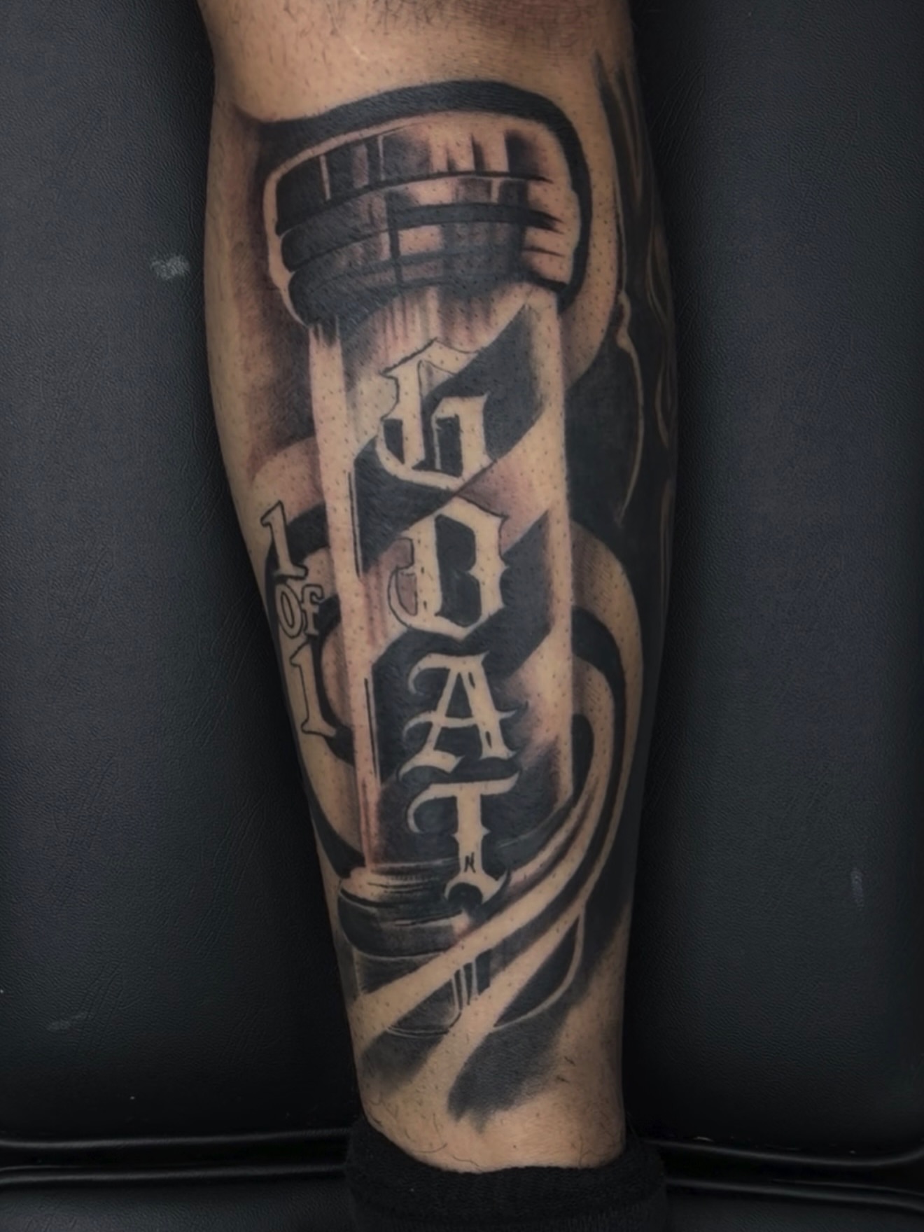 Hourglass black and grey tattoo on the forearm by 🐺