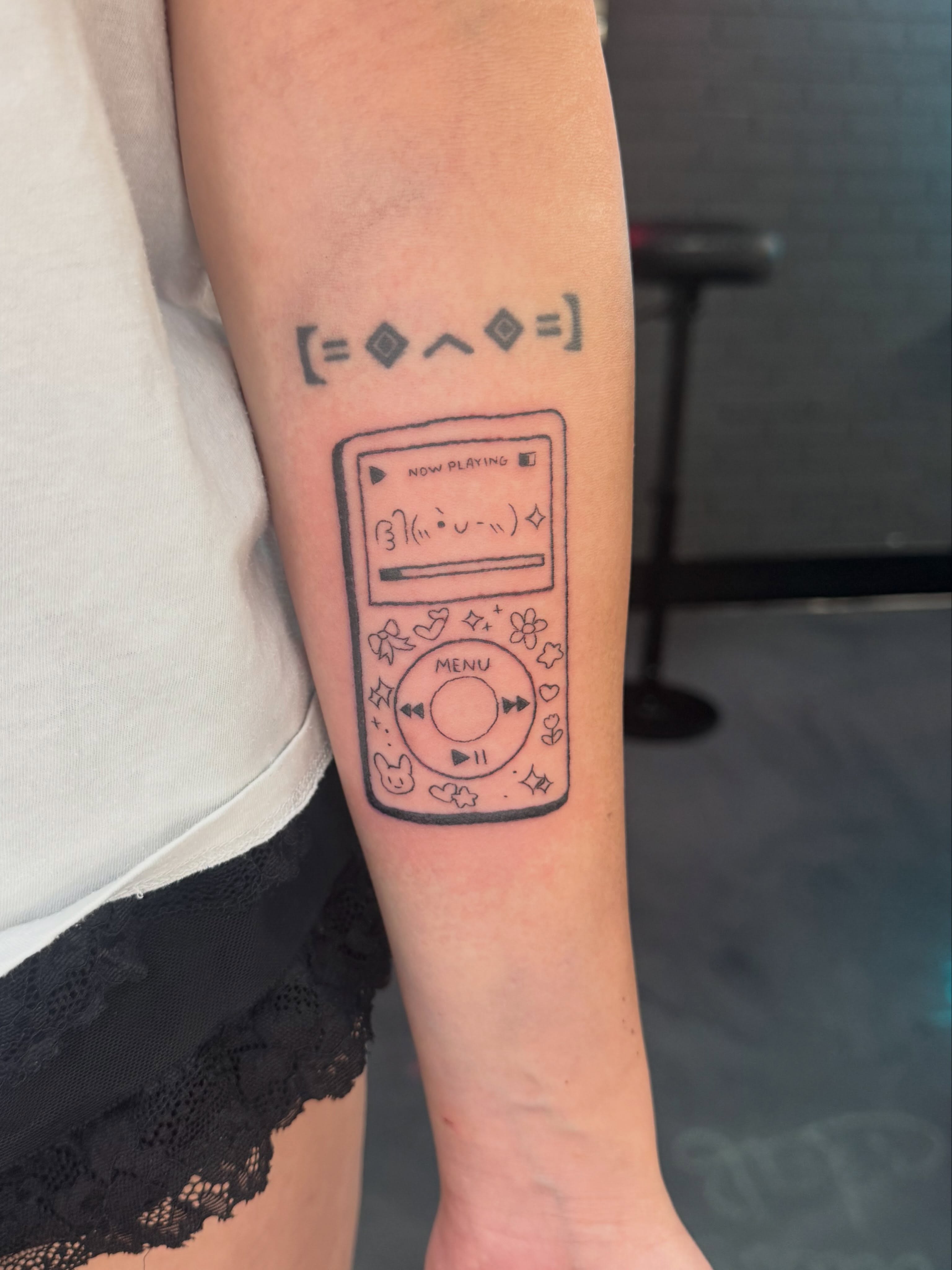 Music player dotwork tattoo on the forearm by Bunny 🐰