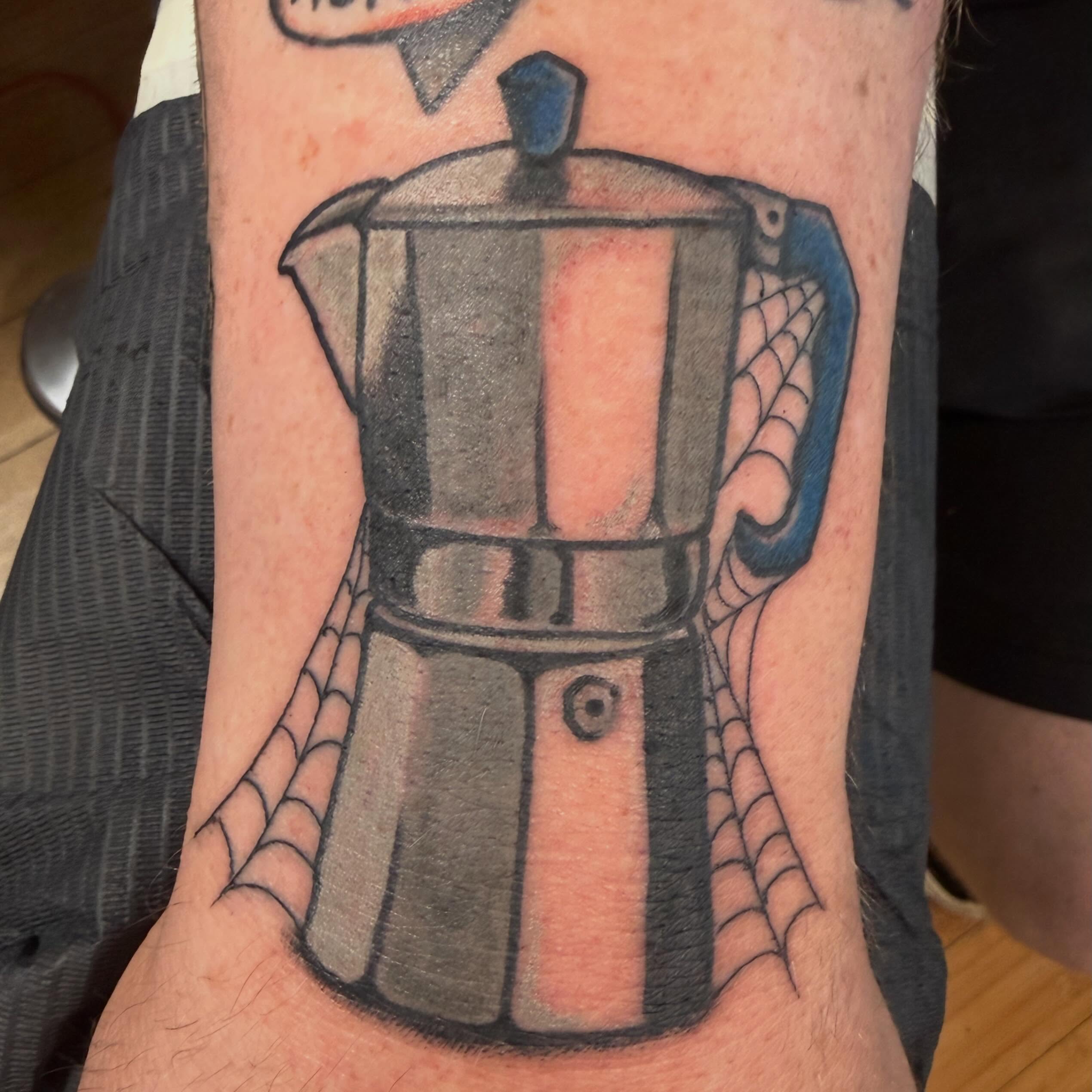 Coffee pot black and grey tattoo on the forearm by Tony Beuke