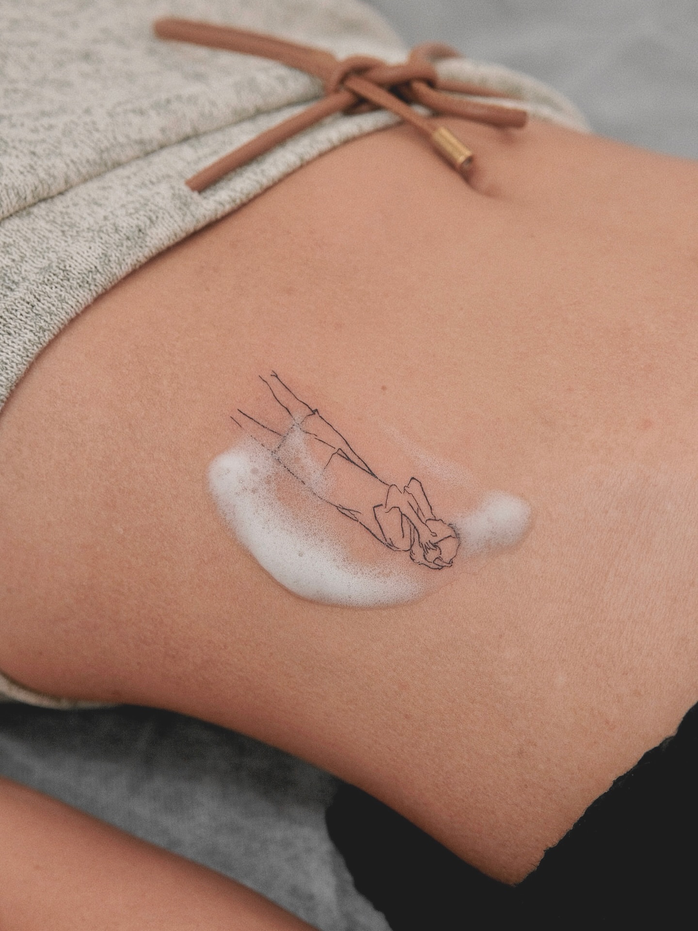 Tattoo by @13.tattooer — minimalist, illustrative