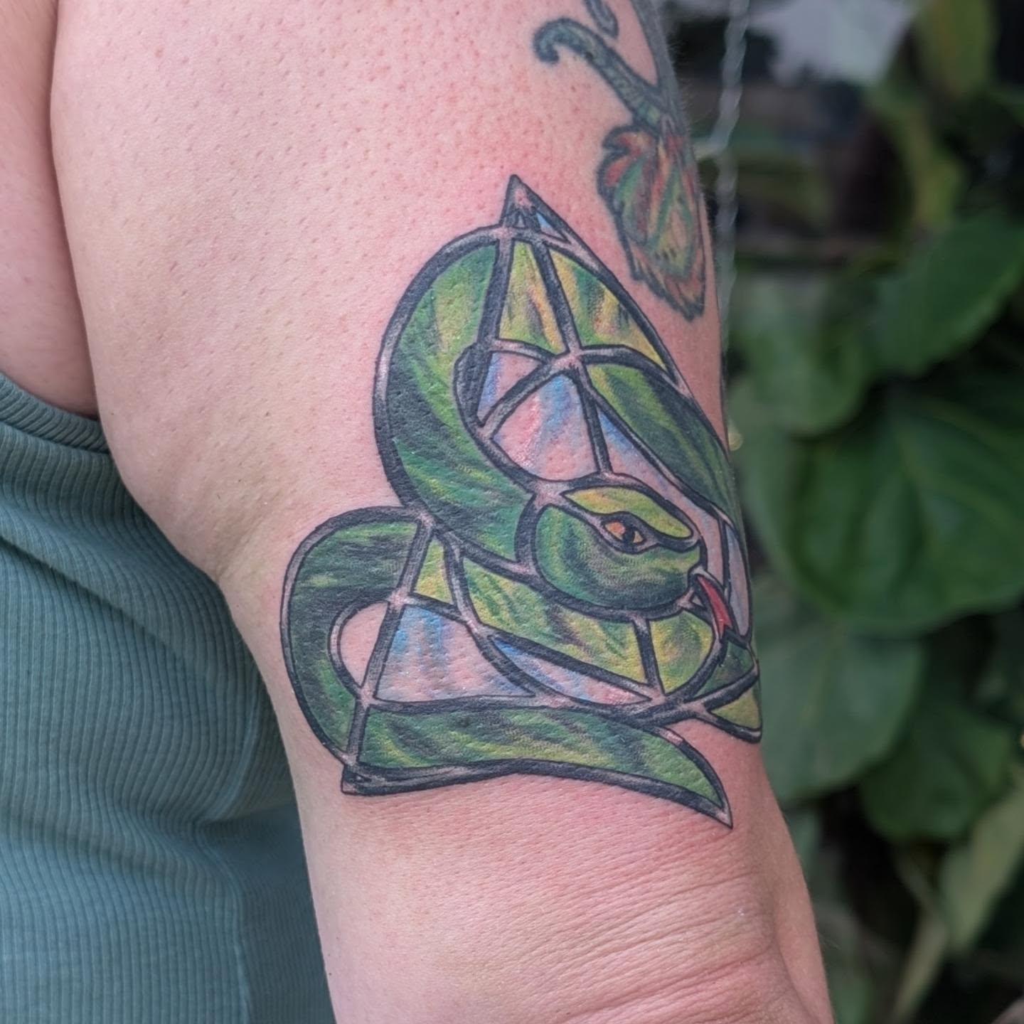 Snake geometric tattoo on the forearm by Hannah Hayes, Livonia, Michigan
