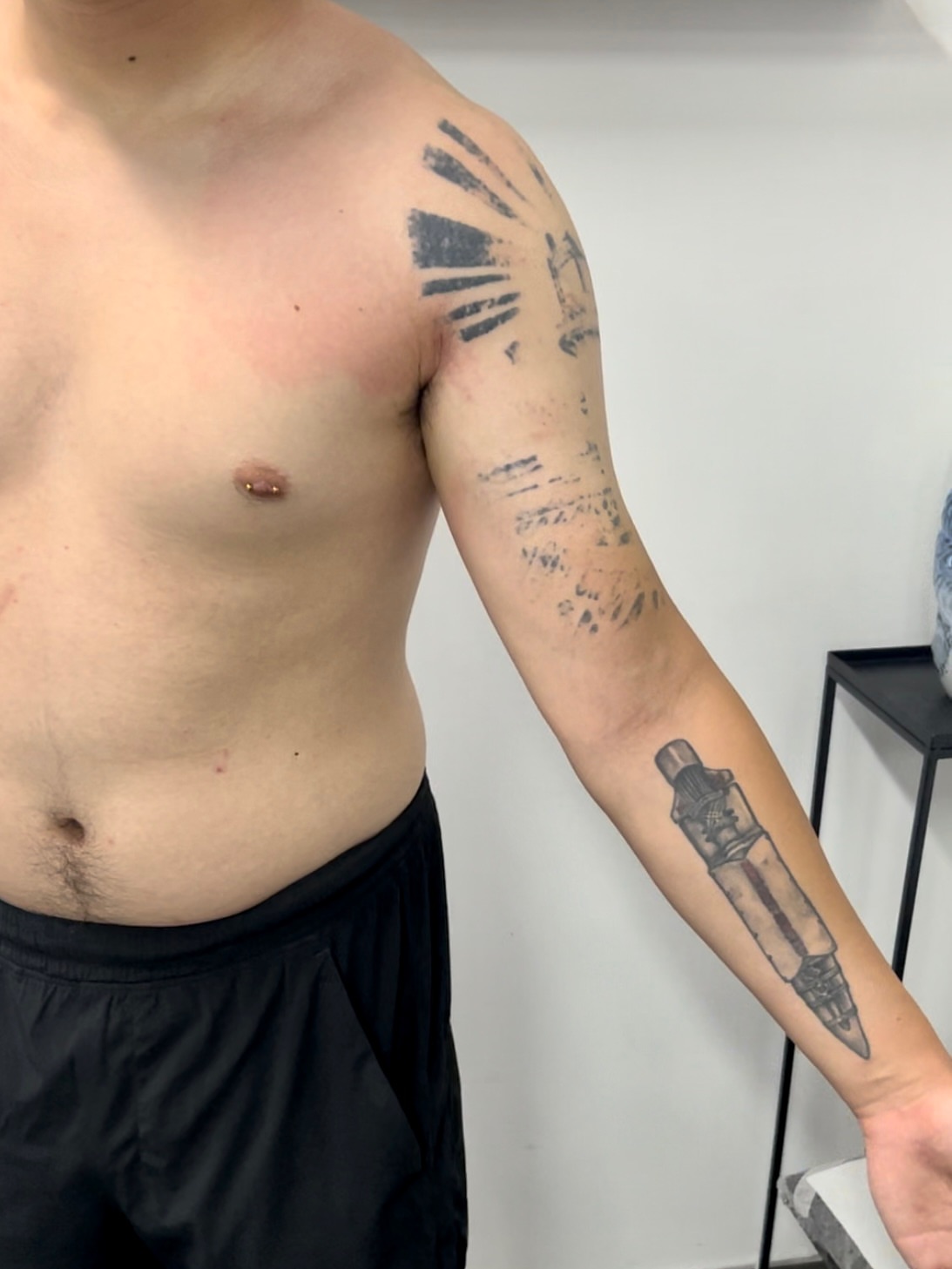 Bullet black and grey tattoo on the forearm by 睿刺造物