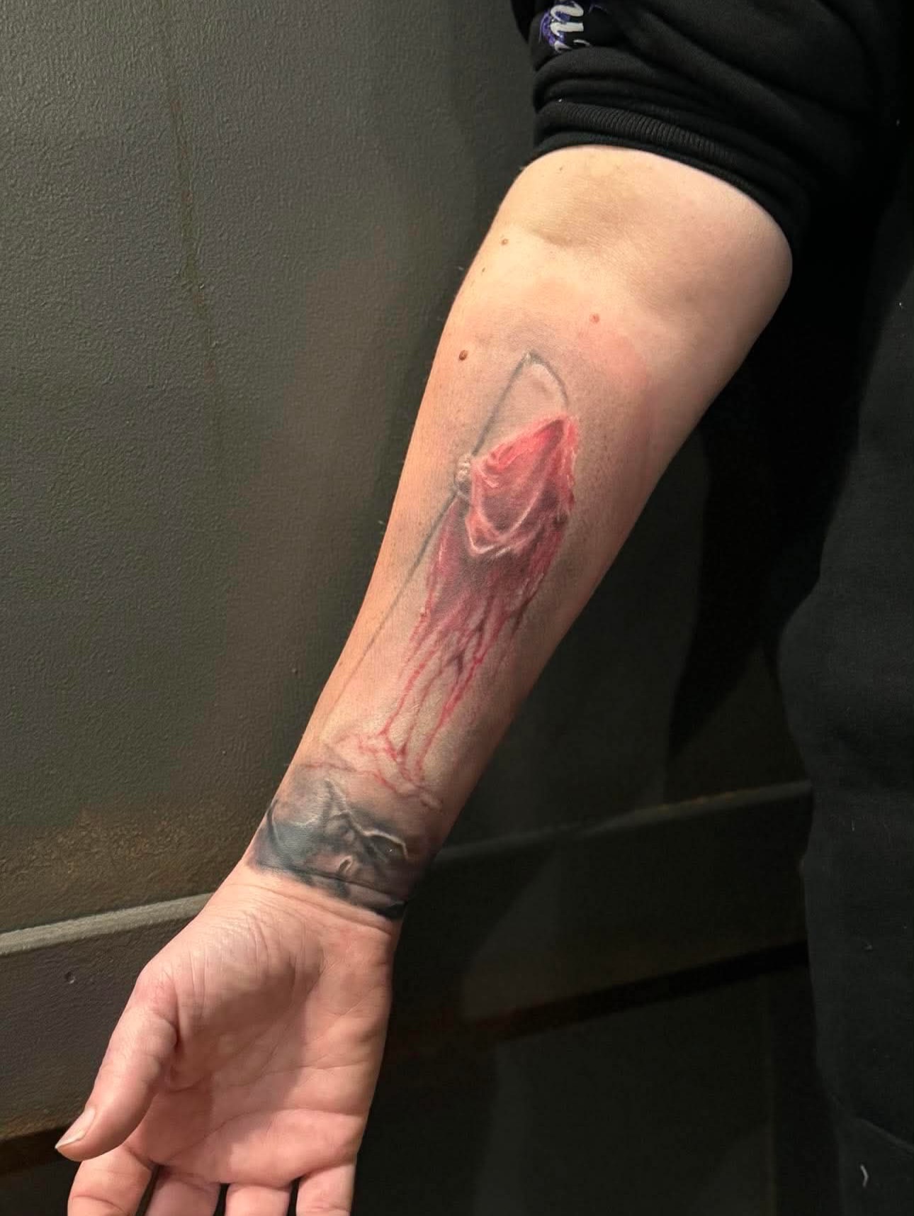 Arrow and blood realism tattoo on the forearm by Kyle J. Bishop