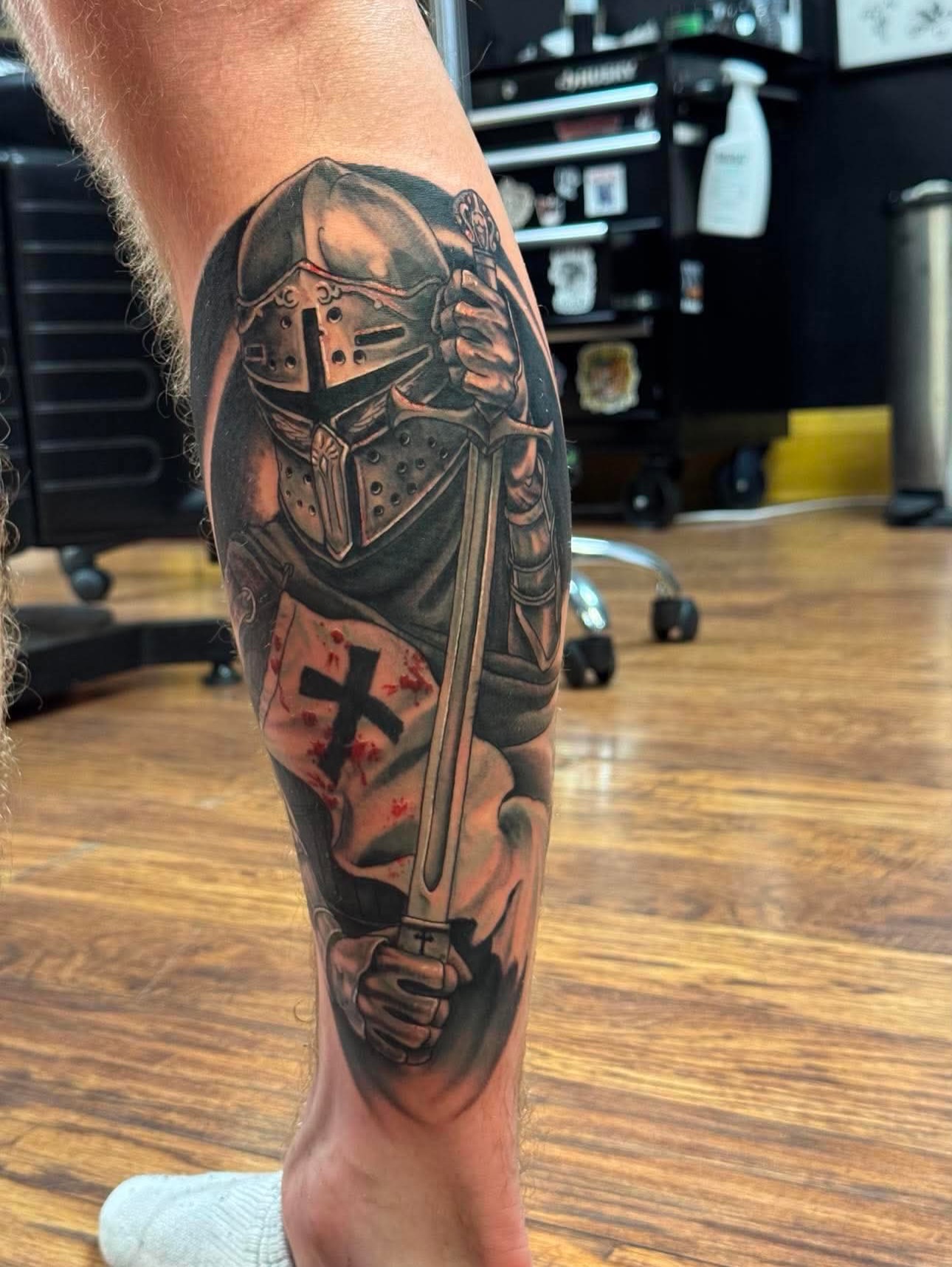 Knight with sword realism tattoo on the forearm by Kyle J. Bishop
