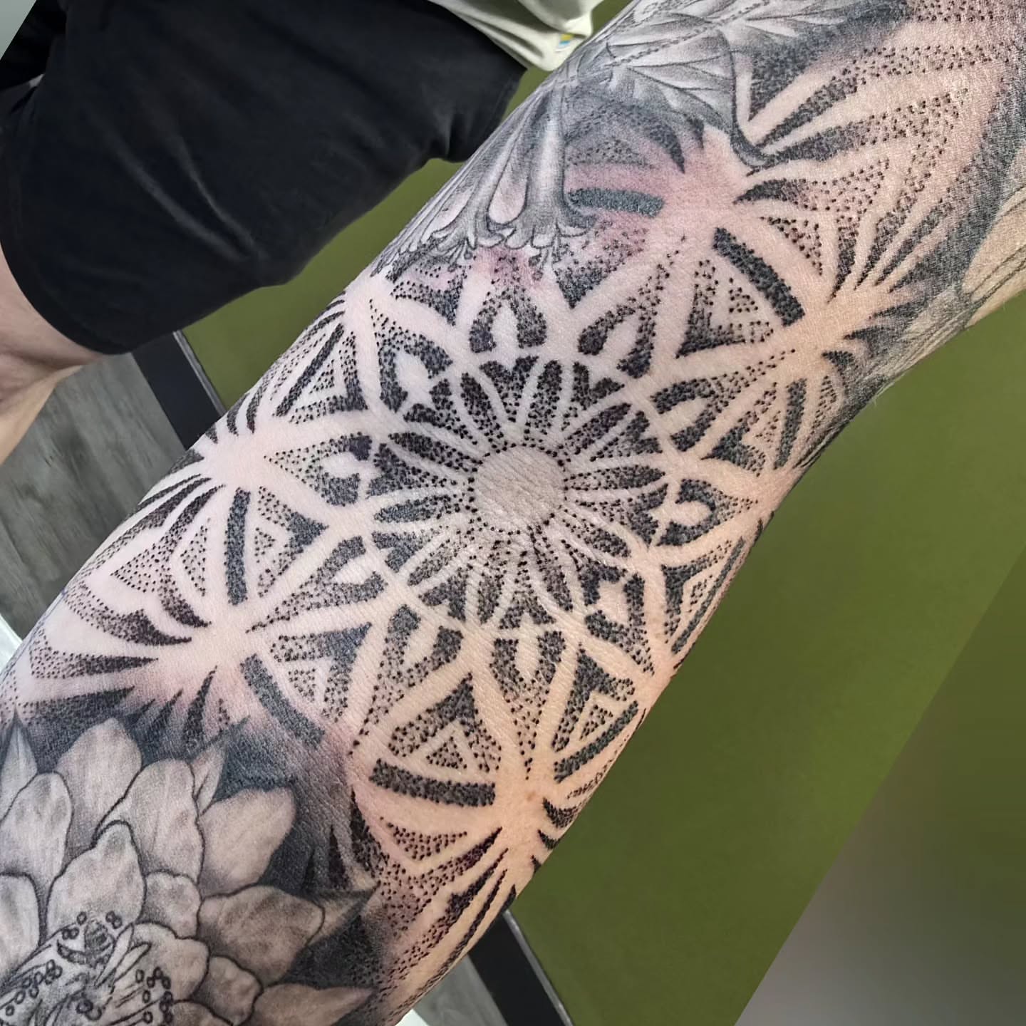 Geometric pattern dotwork tattoo on the forearm by bonnie
