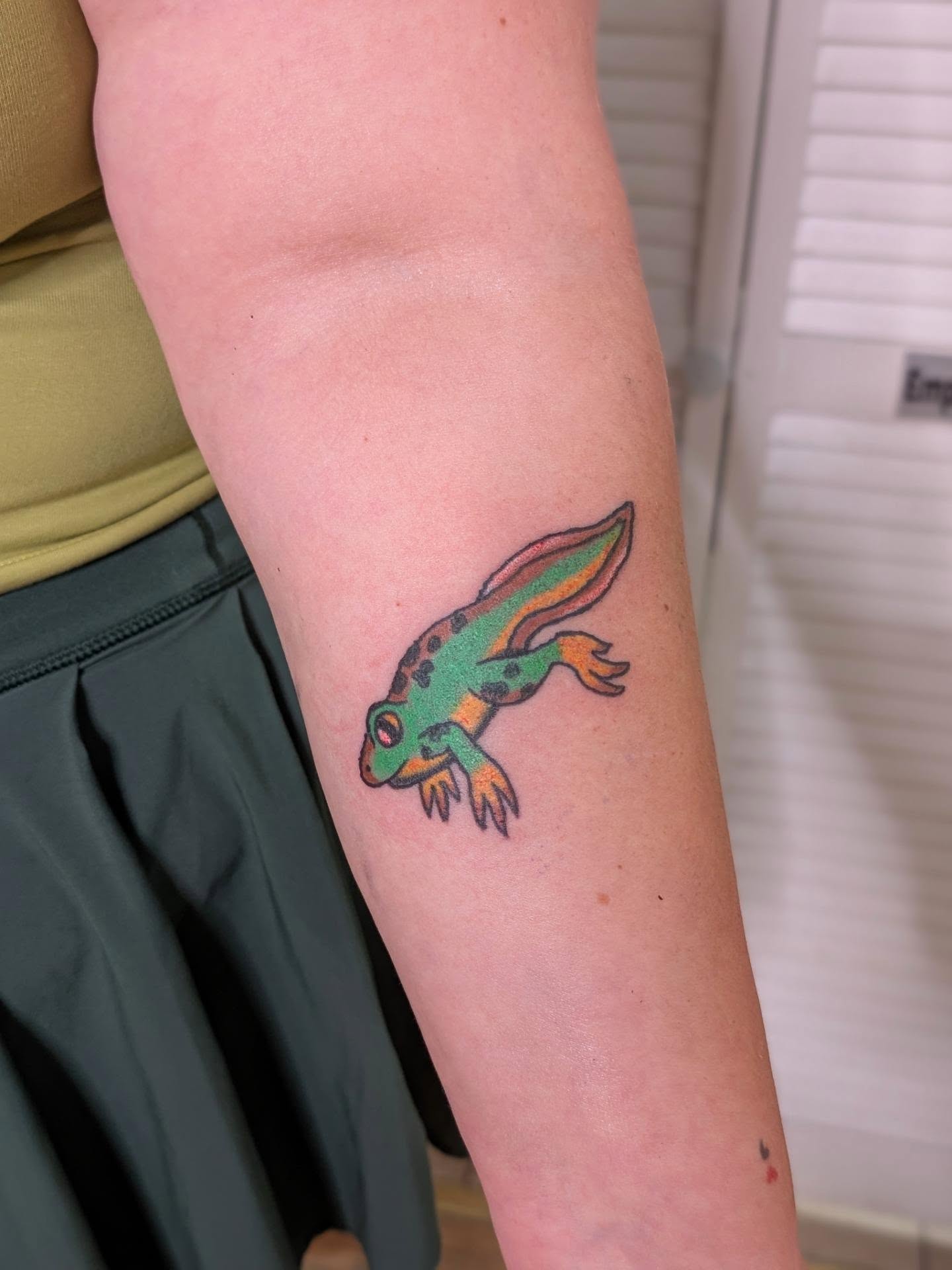 Frog new school tattoo on the forearm by Jon Sedor