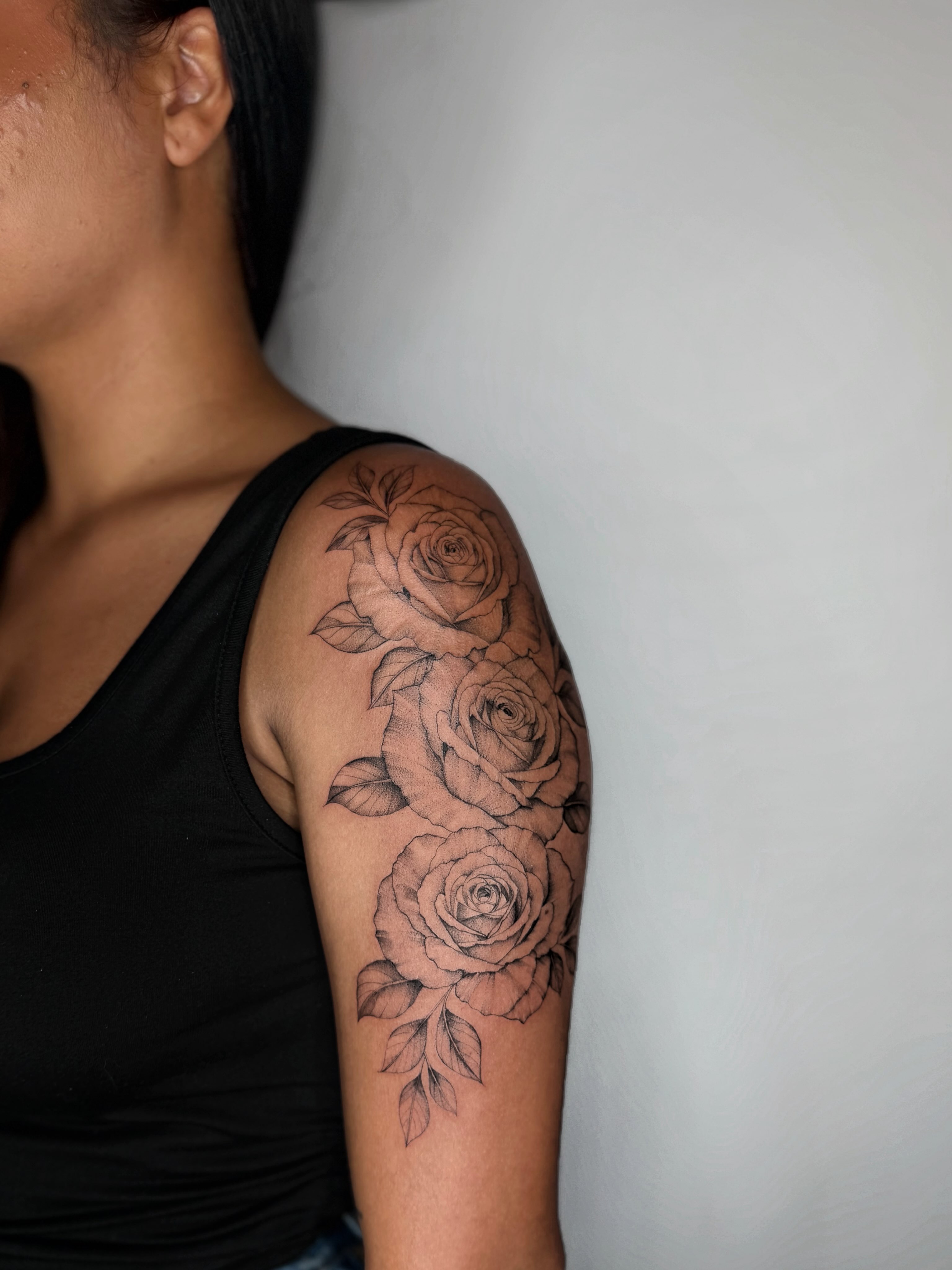 Roses black and grey tattoo on the shoulder by ꜰɪɴᴇ ʟɪɴᴇ ᴛᴀᴛᴛᴏᴏꜱ