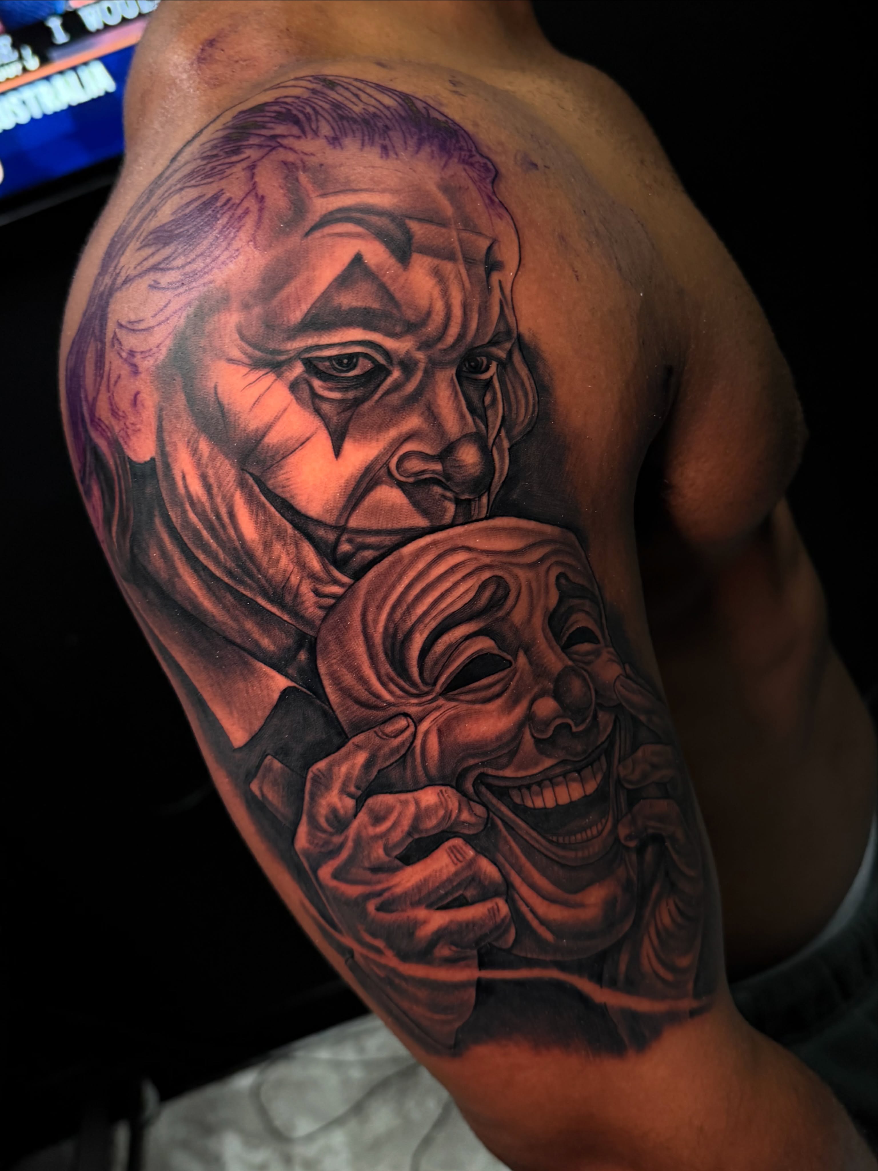 Mask and old man realism tattoo on the upper arm by Vondrae