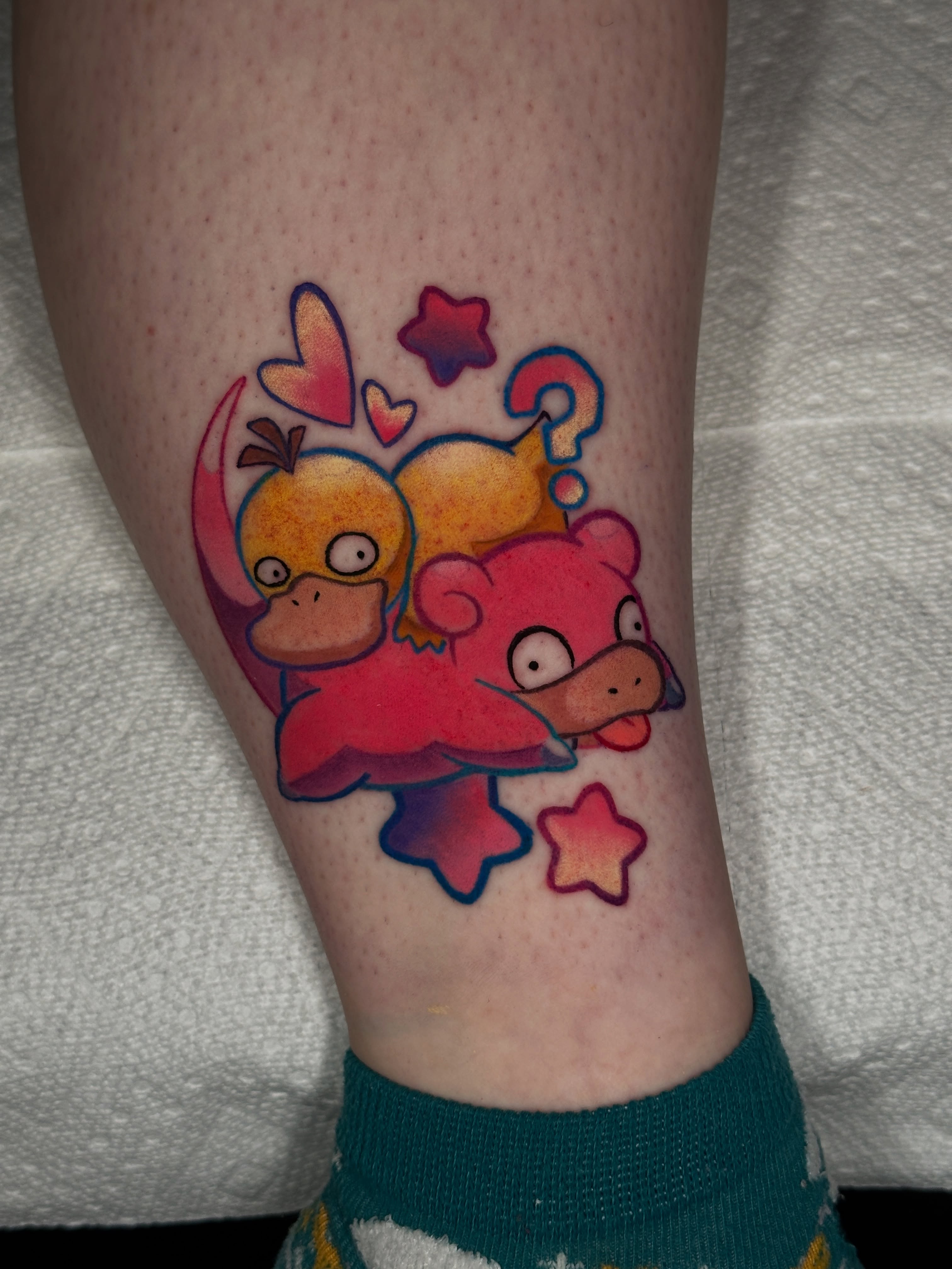 Squirtle and seel new school tattoo on the forearm by Dustin Hughes