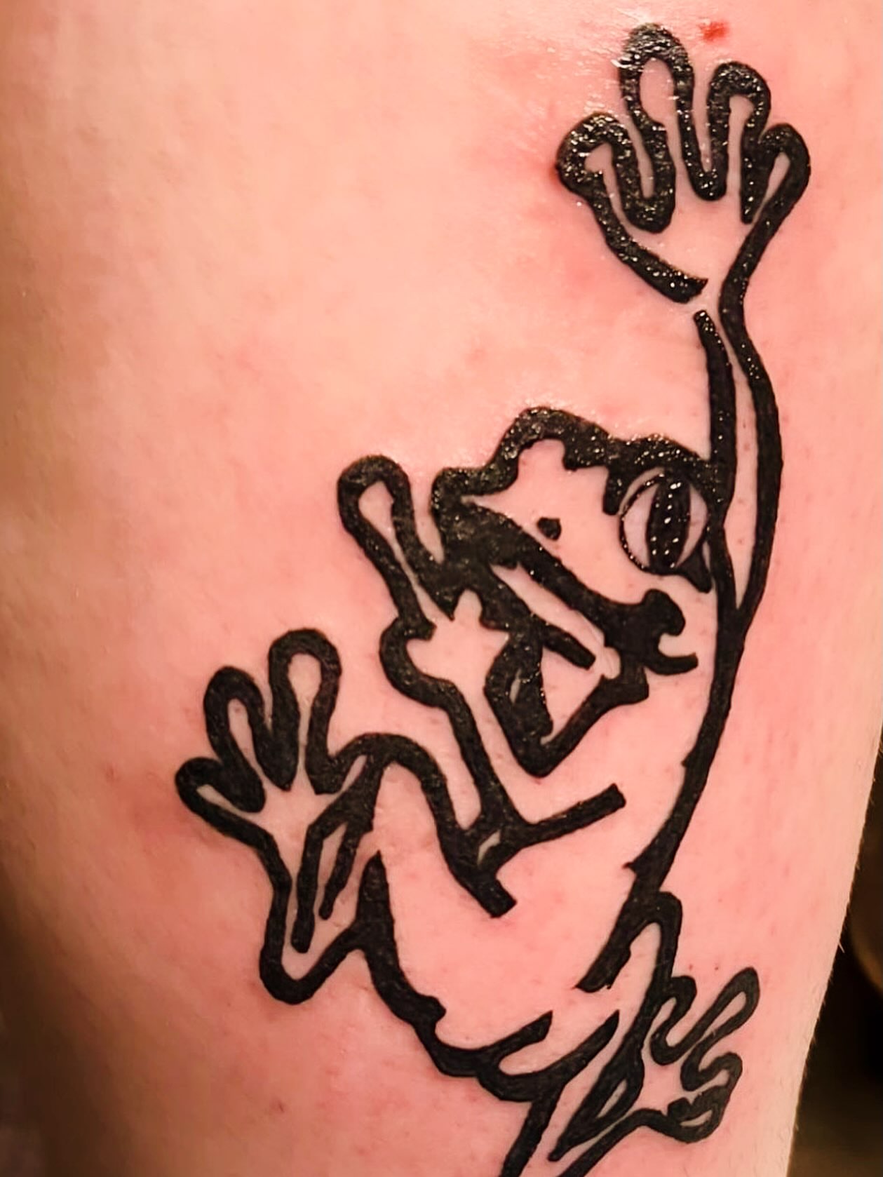Abstract figure minimalist tattoo on the thigh by RVA Tattoo Artist