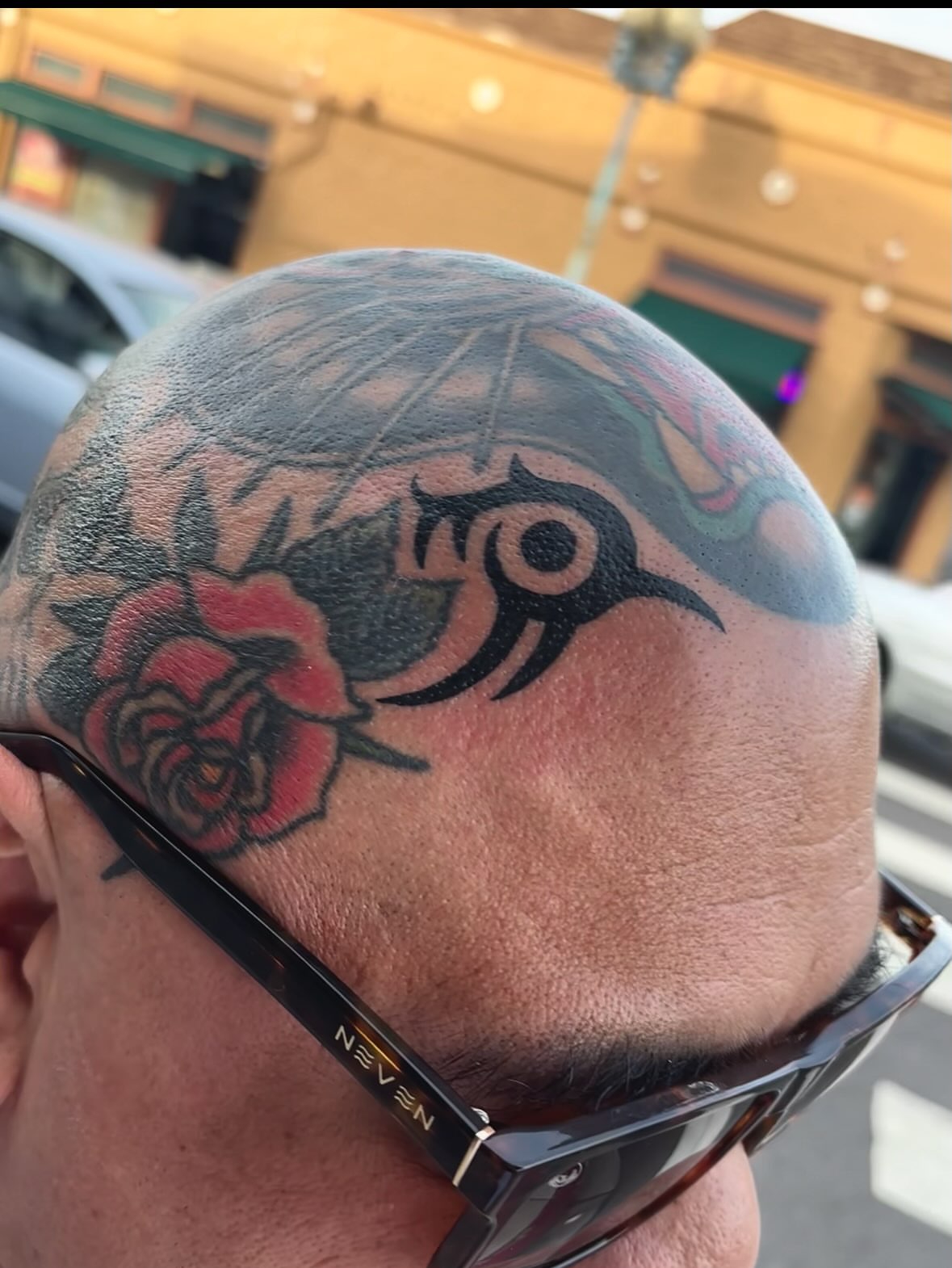 Bird and rose American traditional tattoo on the head by ๐๐๐ฏ๐ข๐ซ
