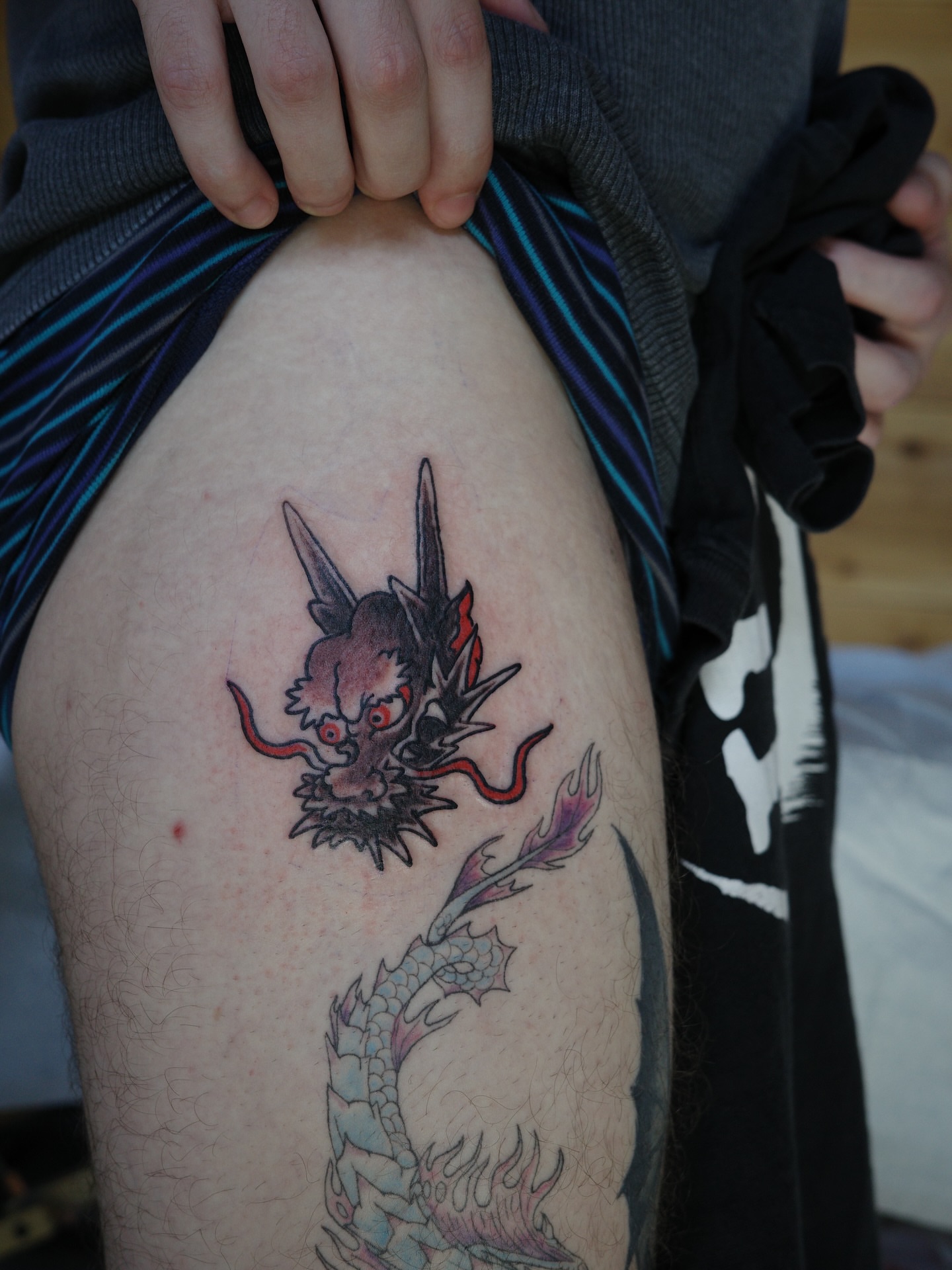 Dragon japanese irezumi tattoo on the thigh by Innokenty Meshchakov, Portland, Oregon