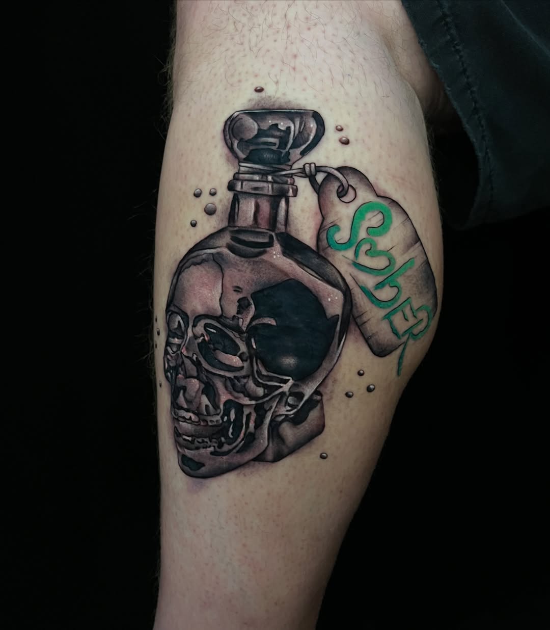 Skull perfume bottle realism tattoo on the forearm by Cuda