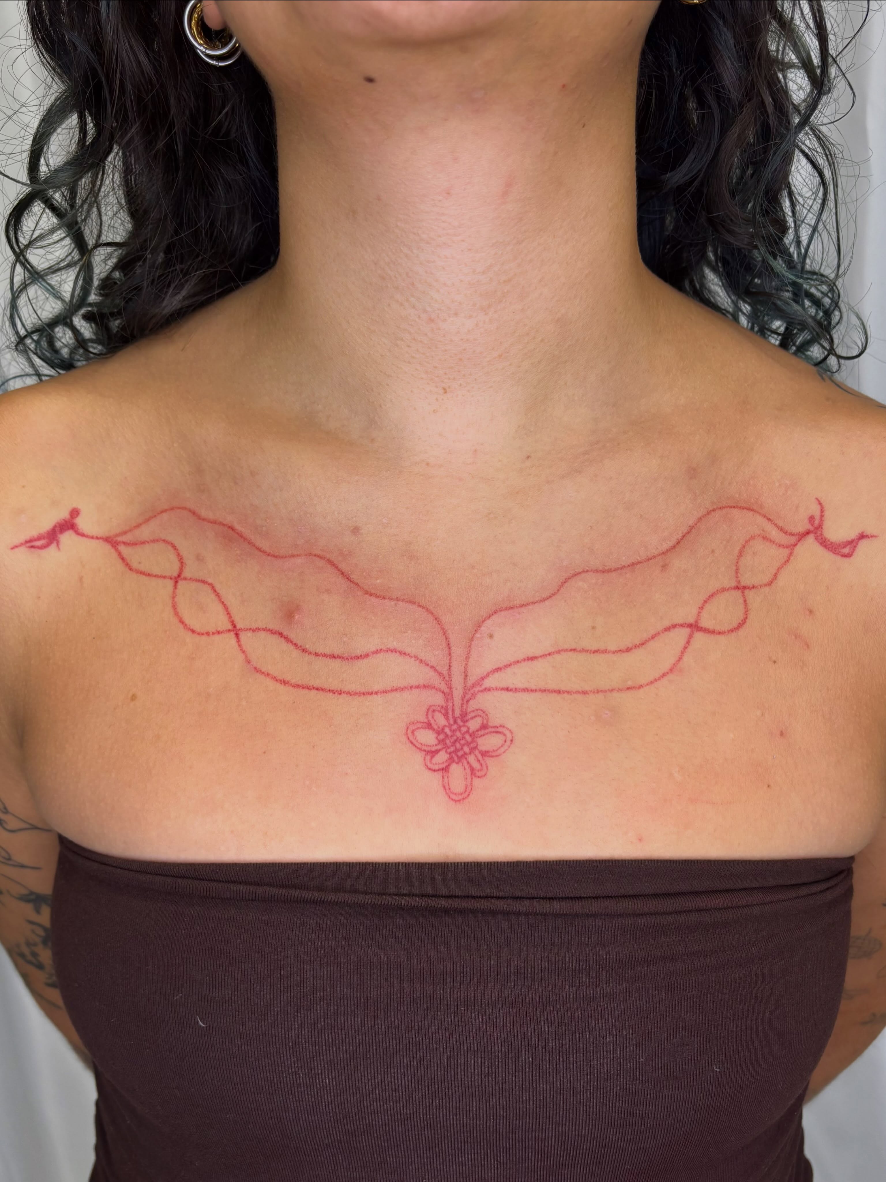 Flower and ribbon geometric tattoo on the chest by sabrina ✿ ◔ ں ◔ ✿ san francisco tattoo!