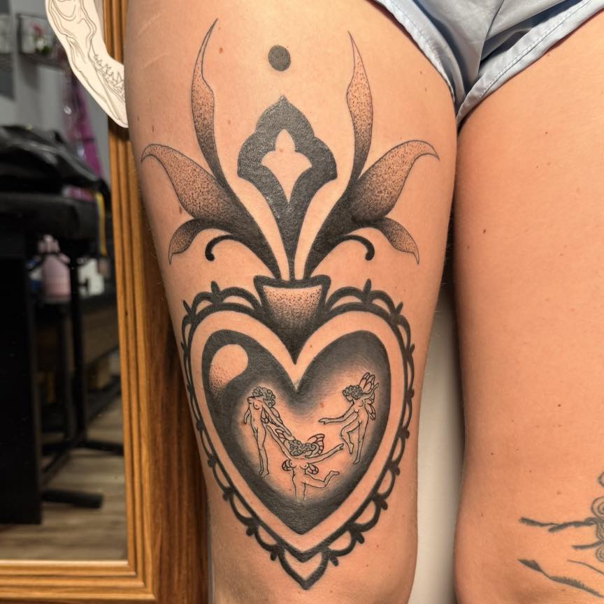 Heart with cherubs dotwork tattoo on the thigh by Destiny A