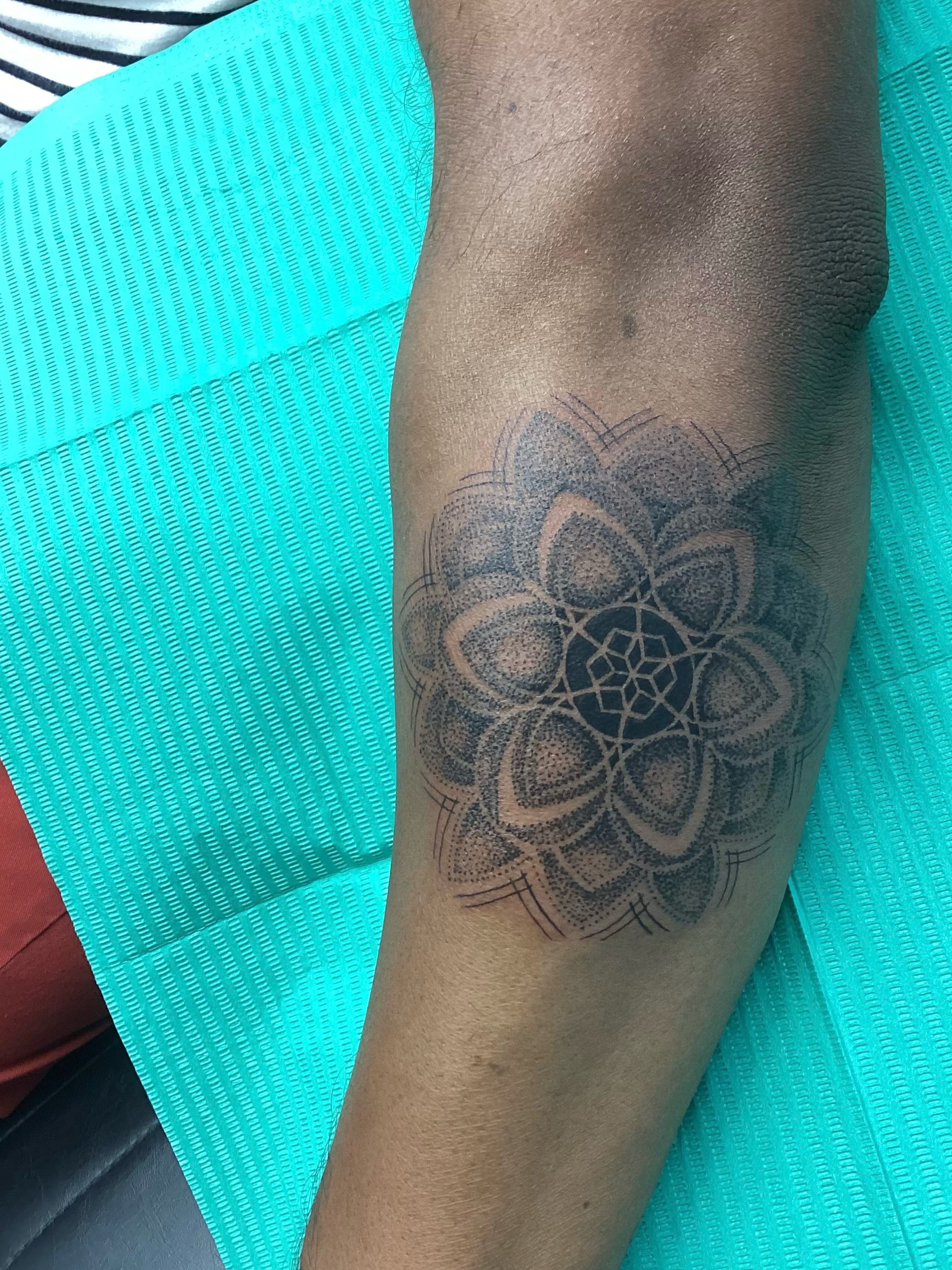 Mandala dotwork tattoo on the forearm by Amanda Plavan