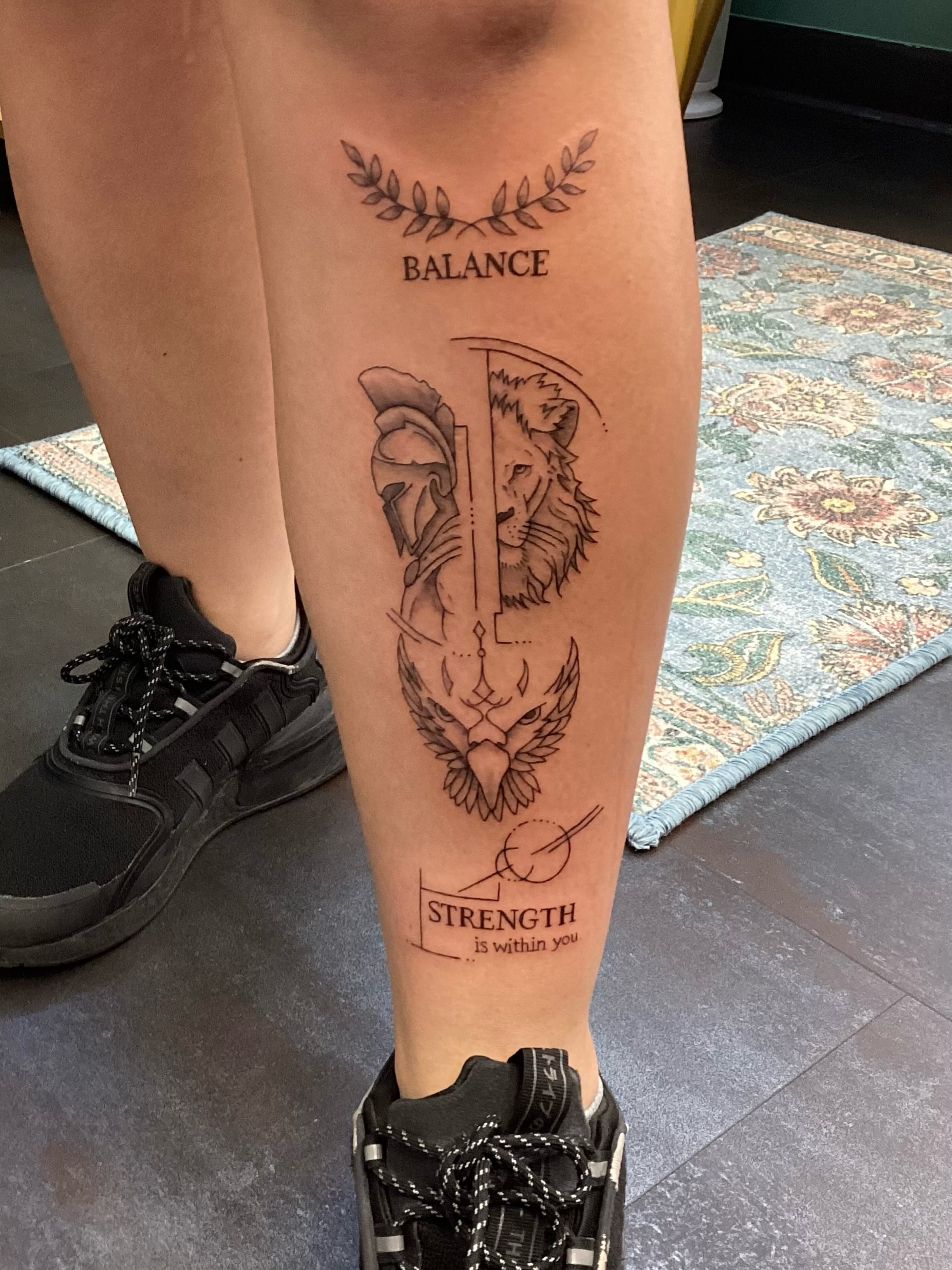 Balance geometric tattoo on the calf by Amanda Plavan