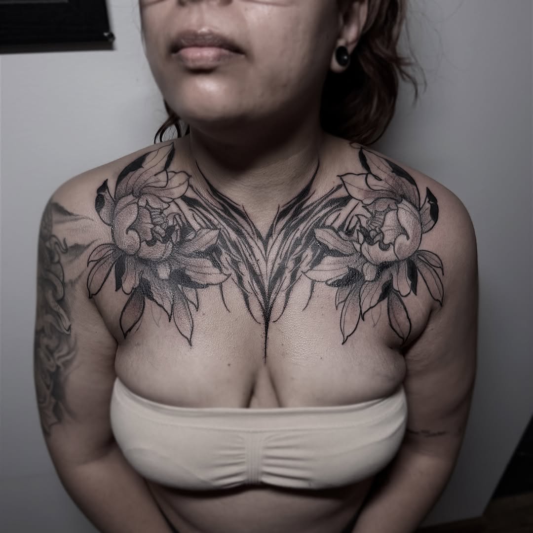 Floral black and grey tattoo on the chest by Rafael Alfredo Armas Hoyos, Salt Lake City, Utah