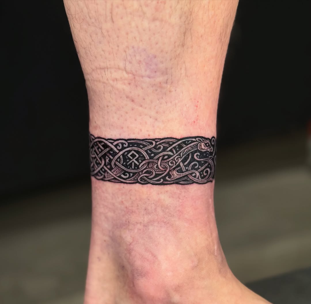 Tattoo by @ethanlundtattooing — blackwork, geometric