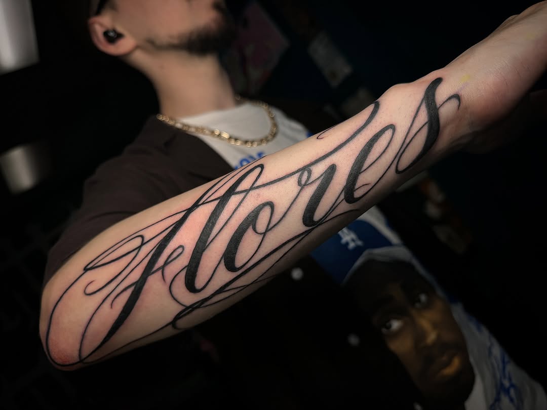 Tattoo by @astralstarink — lettering_script, chicano
