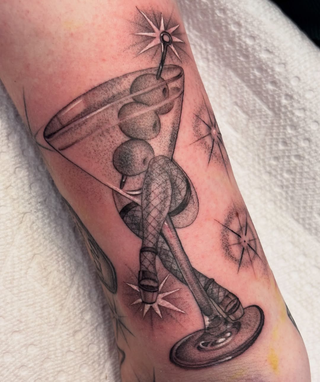 Space rocket black and grey tattoo on the forearm by Storm