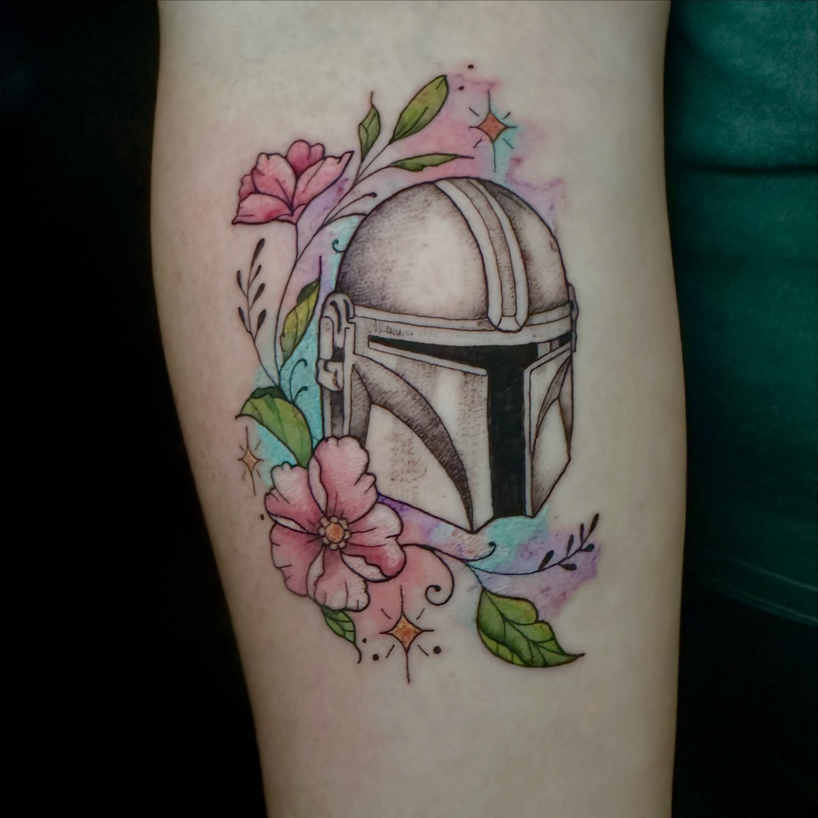 Mandalorian helmet watercolor tattoo on the forearm by Sam, Mount Laurel, New Jersey