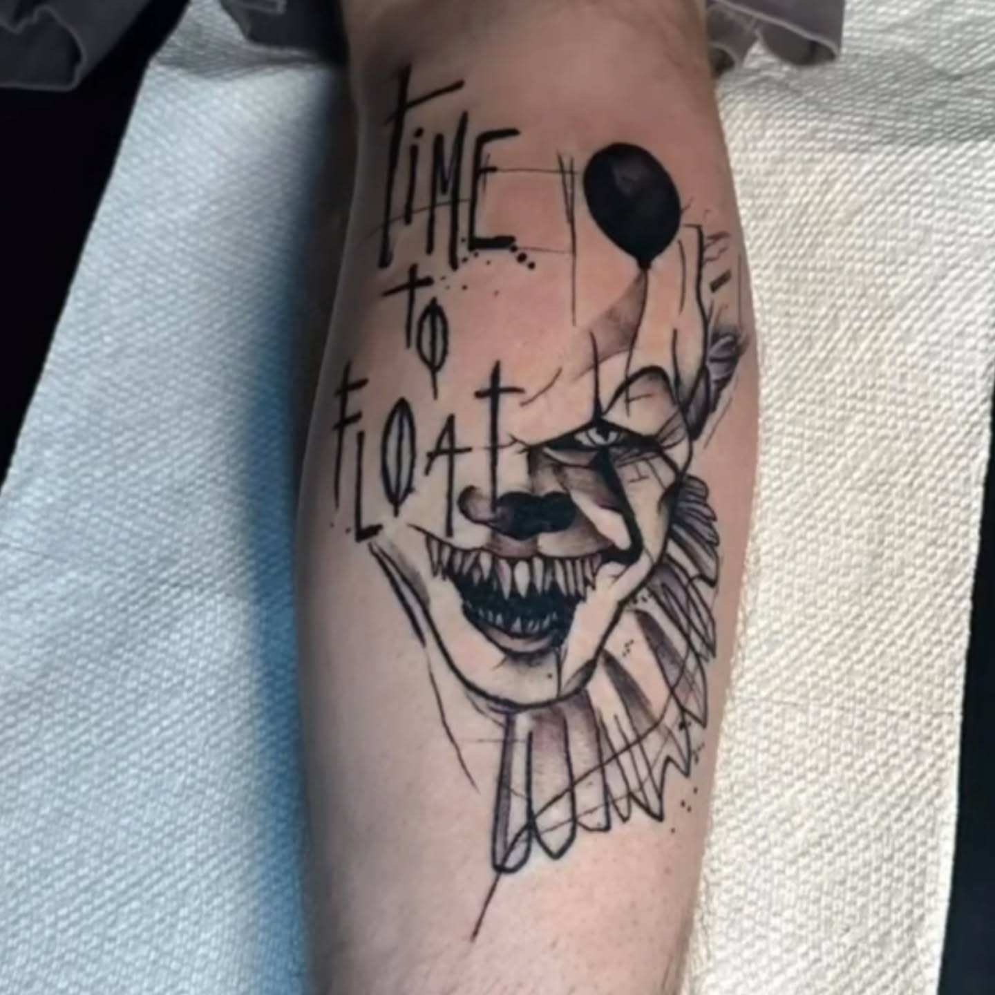 Clown face realism tattoo on the forearm by Don Lee