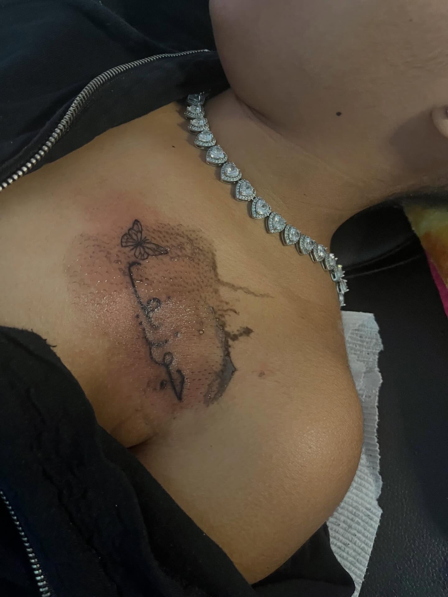Skull and butterfly dotwork tattoo on the chest by π Westside