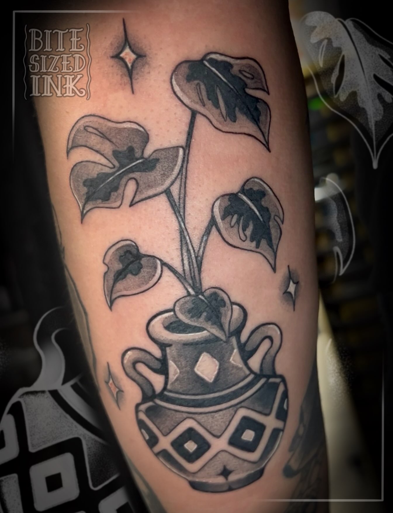 Calla lilies in pot black and grey tattoo on the forearm by ✶ 𝓑𝓲𝓽𝓮𝓼𝓲𝔃𝓮𝓭 𝓘𝓷𝓴 ✶, Buford, Georgia