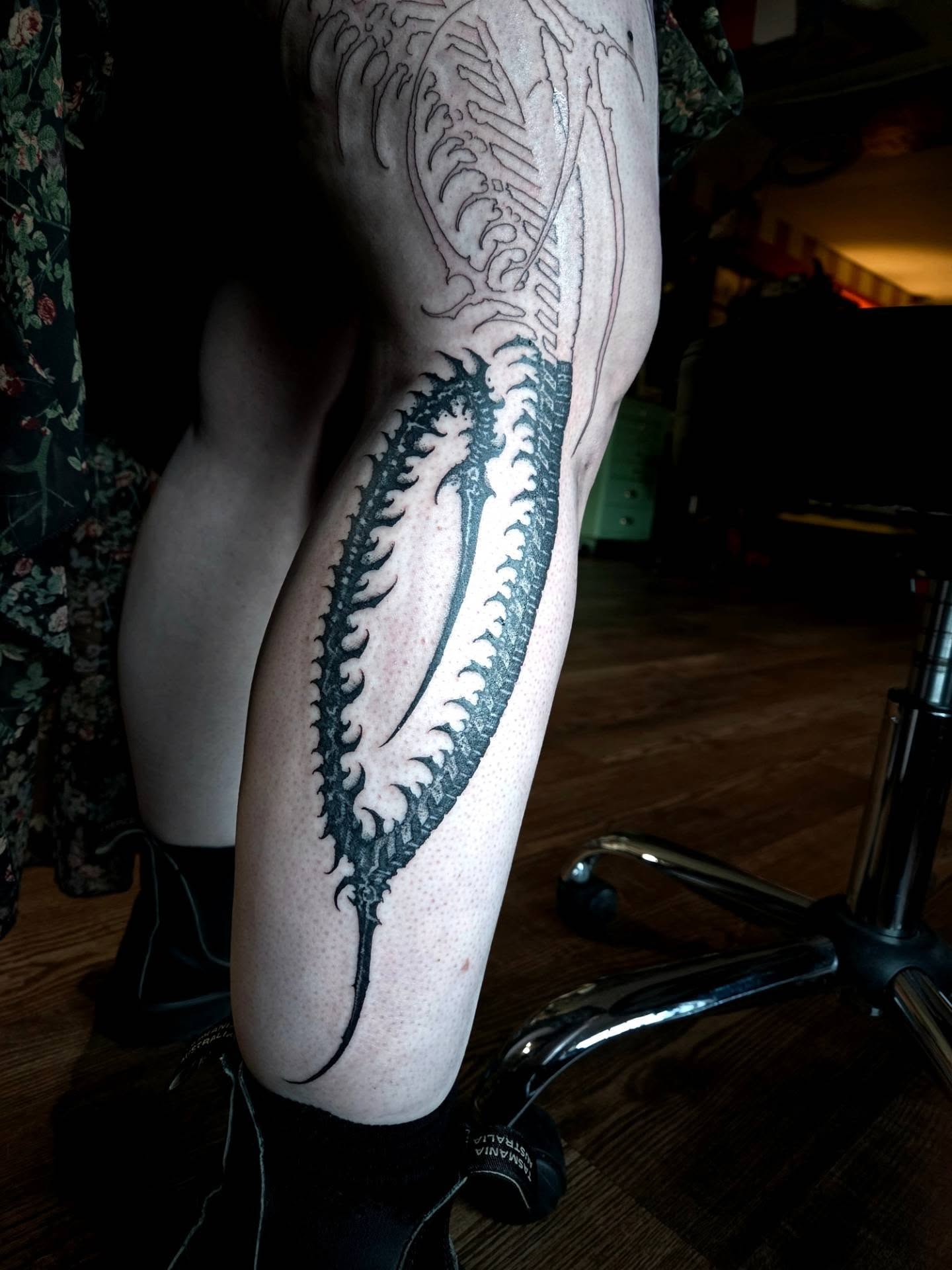 Spiral black and grey tattoo on the leg by @hellscribe