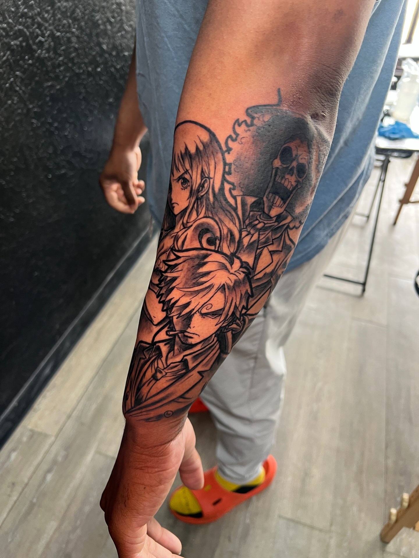Anime characters anime tattoo on the forearm by Justx4rt