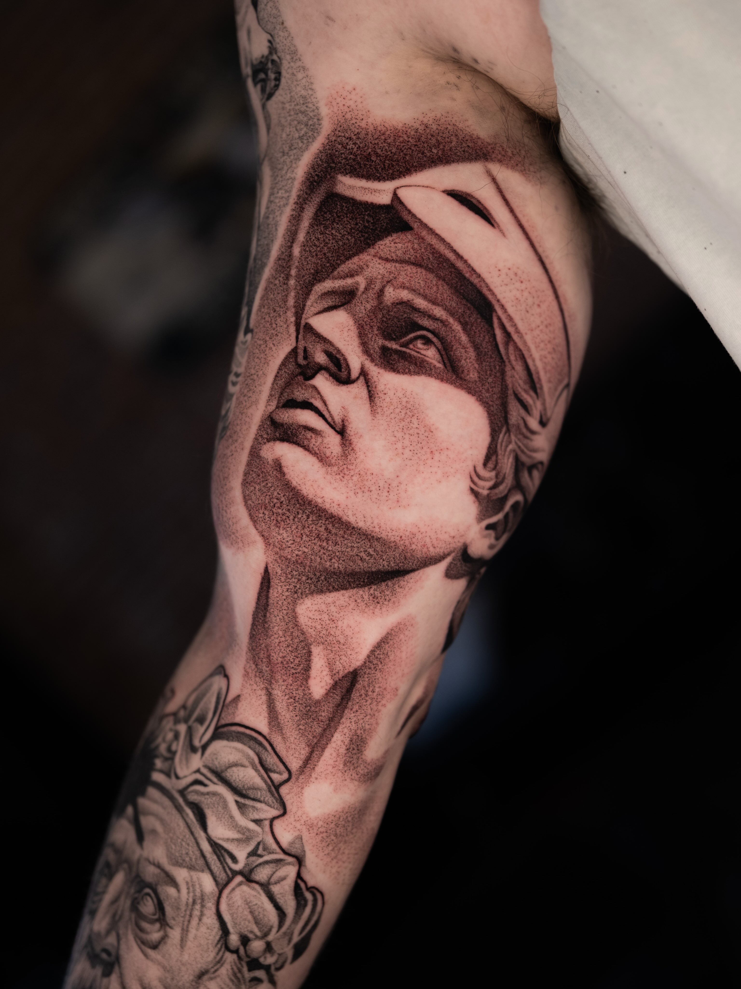 Portrait dotwork tattoo on the forearm by Craig St Peter, Kansas City, Missouri