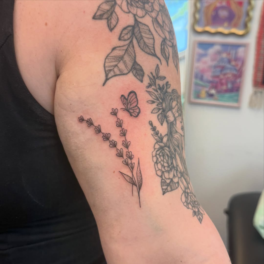 Floral and butterfly black and grey tattoo on the forearm by ✨olivia