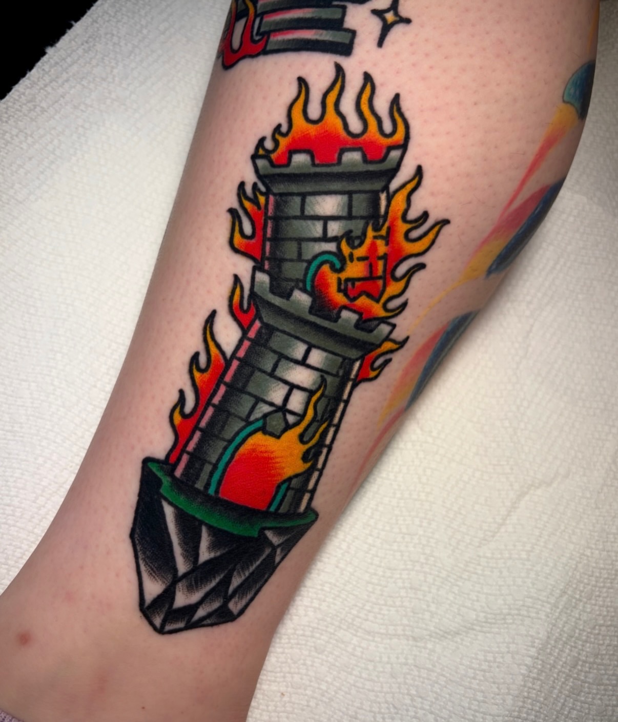 Castle tower American traditional tattoo on the forearm by Mickey Putillo, Charlotte, North Carolina